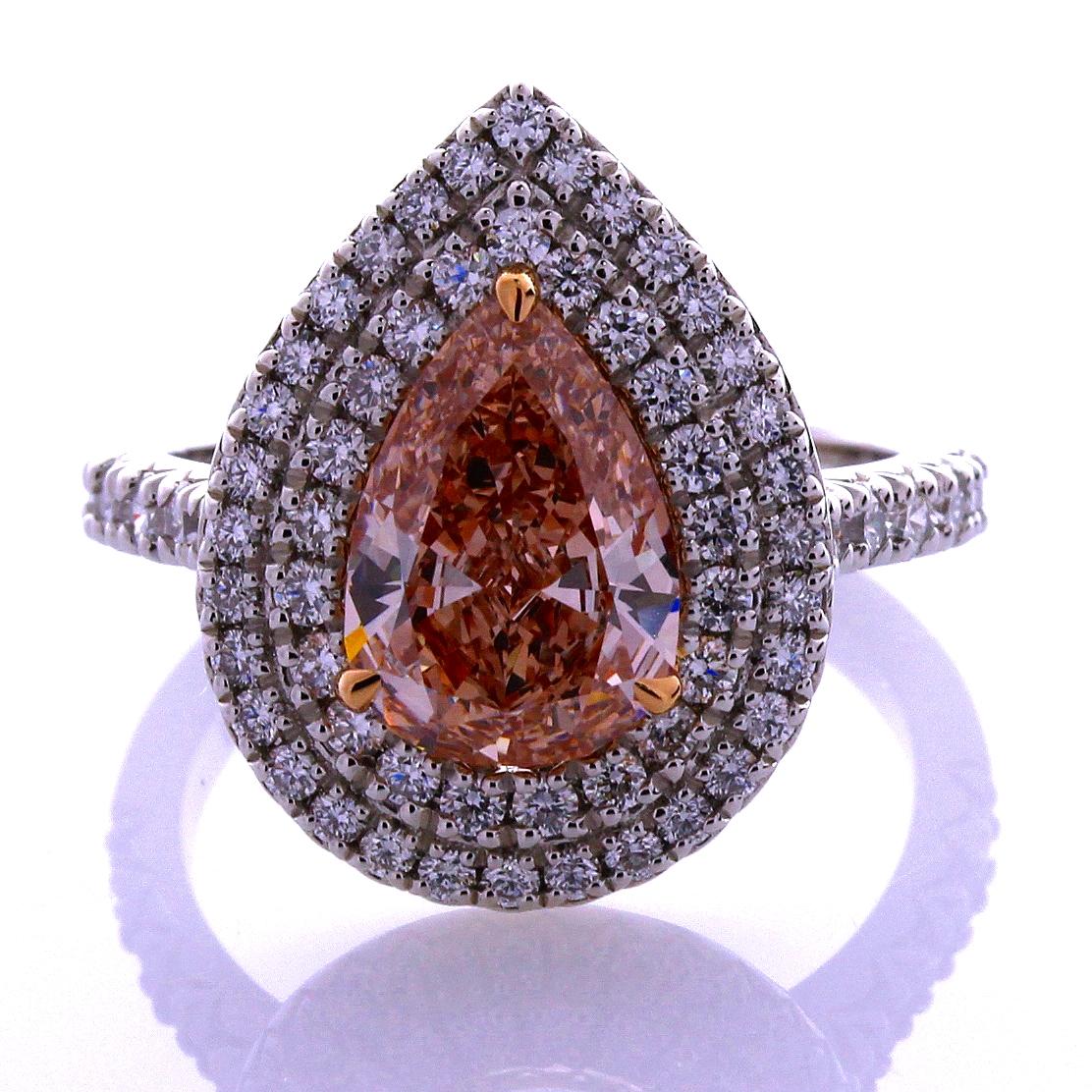 Incredible Deal on GIA Certified 1.59 carat Pear Shape, Natural Fancy Brown-Pink Even Diamond Ring, VS2 clarity, measuring 10.42-7.18x3.52. Total Carat Weight on the ring is 2.38.
GIA CERTIFICATE #6194904699. 
This classic contemporary mounting was