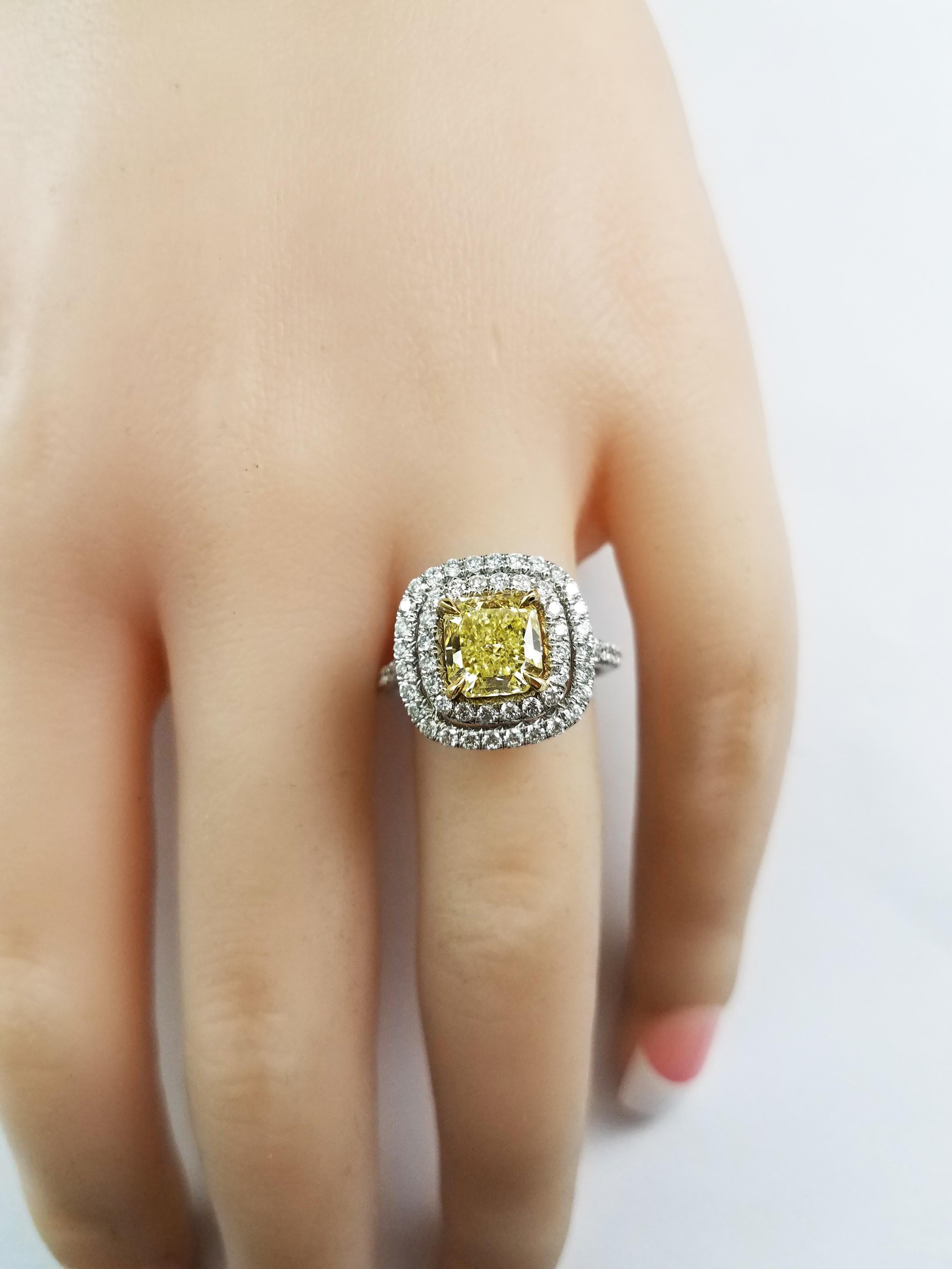 GIA Certified 1.59 Carat Radiant Cut Yellow Diamond Halo Engagement Ring In New Condition In New York, NY