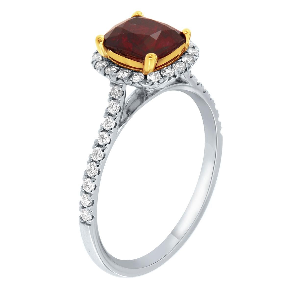 This 18K gold halo ring features perfectly matched brilliant round diamonds 1.3 mm each Micro-Prong set on a 1.7 mm wide shank. In the center of the ring is set one unique natural Ruby in an 18k Yellow gold cup. This exceptional 1.60 Carat Ruby