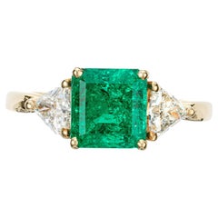 GIA Certified 1.60 Carat Emerald Diamond Gold Three-Stone Engagement Ring