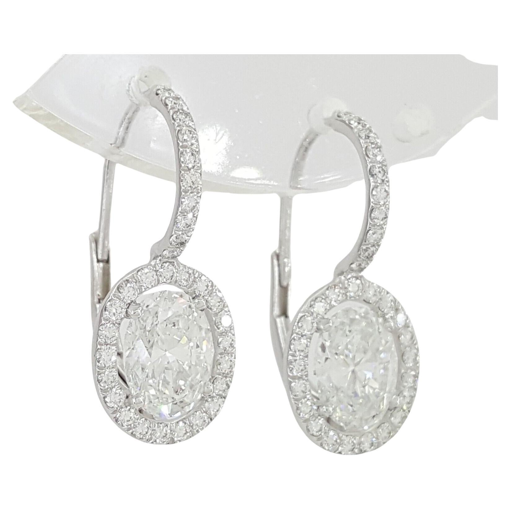 GIA Certified 1.60 Carat Round Brilliant Cut Diamond Dangle Earrings. For Sale