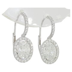 GIA Certified 1.60 Carat Round Brilliant Cut Diamond Dangle Earrings.