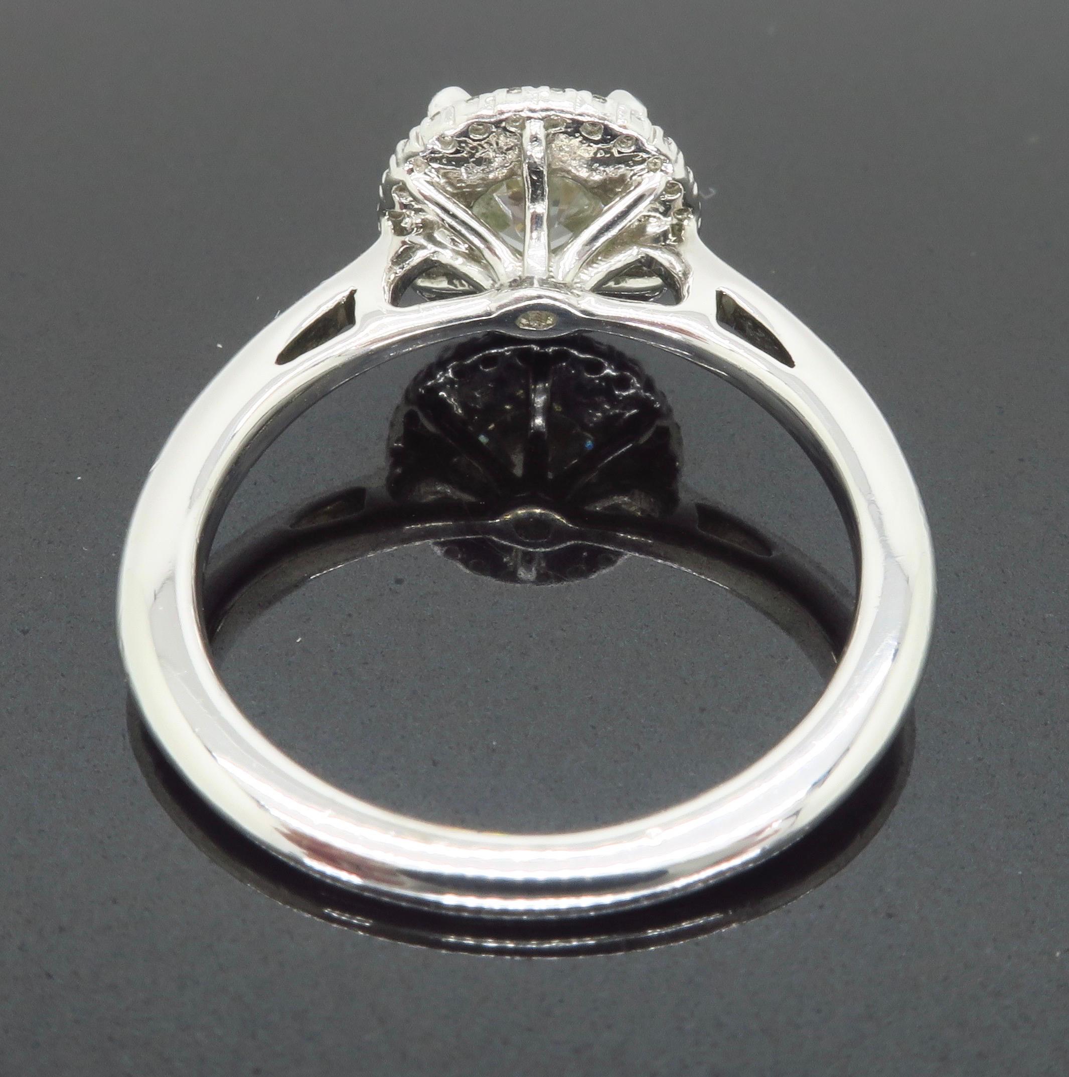 GIA Certified 1.52 Carat VVS1 Diamond Halo Engagement Ring In New Condition In Webster, NY