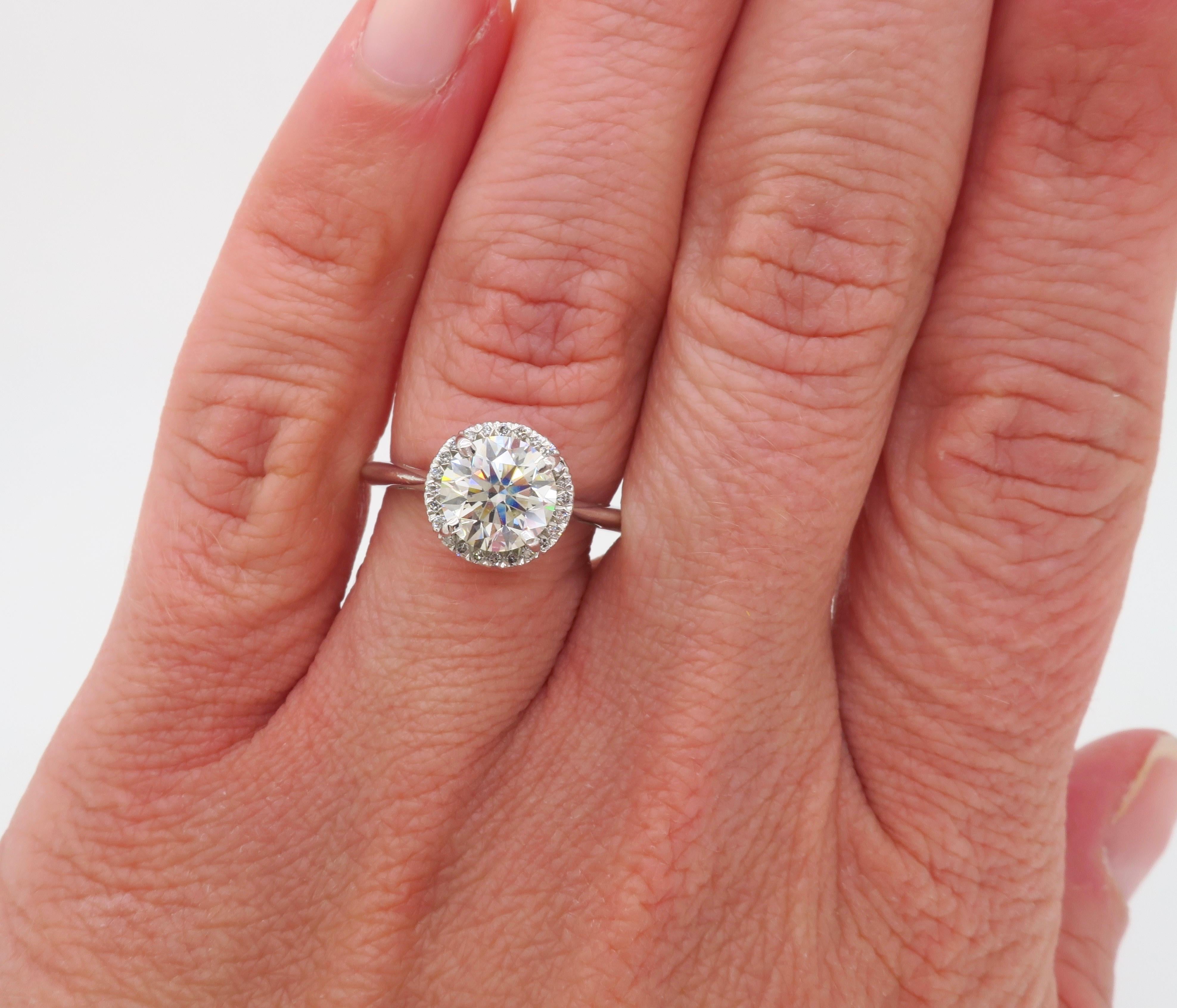 GIA Certified 1.52 Carat VVS1 Diamond Halo Engagement Ring 1