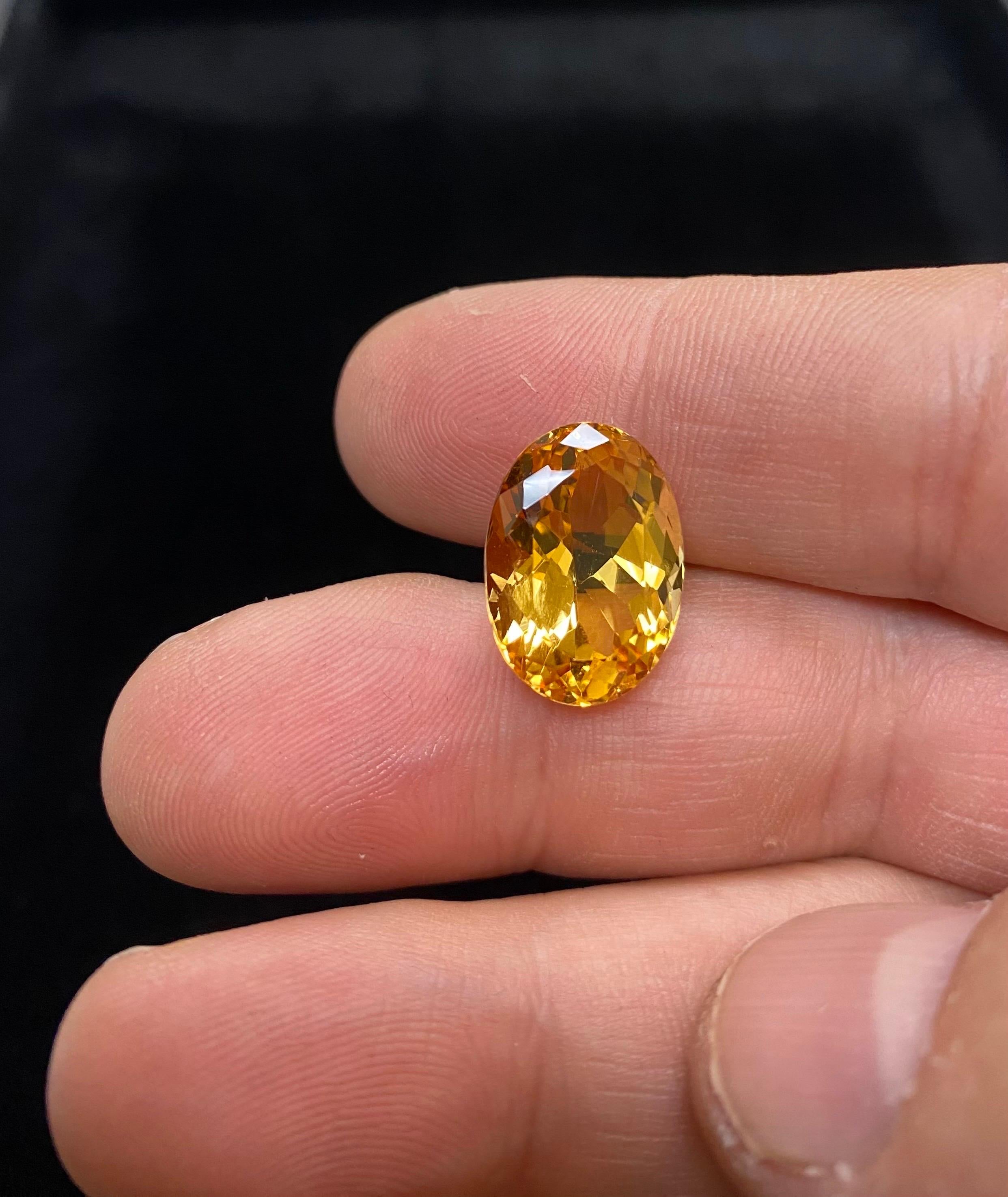 GIA Certified 16.16 Carat Orange Oval Imperial Topaz In New Condition For Sale In Los Angeles, CA