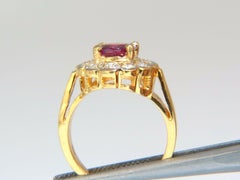 GIA Certified 1.61 Carat Oval Cut Purple Red Ruby 1.01 Carat Diamonds Ring 18 kt