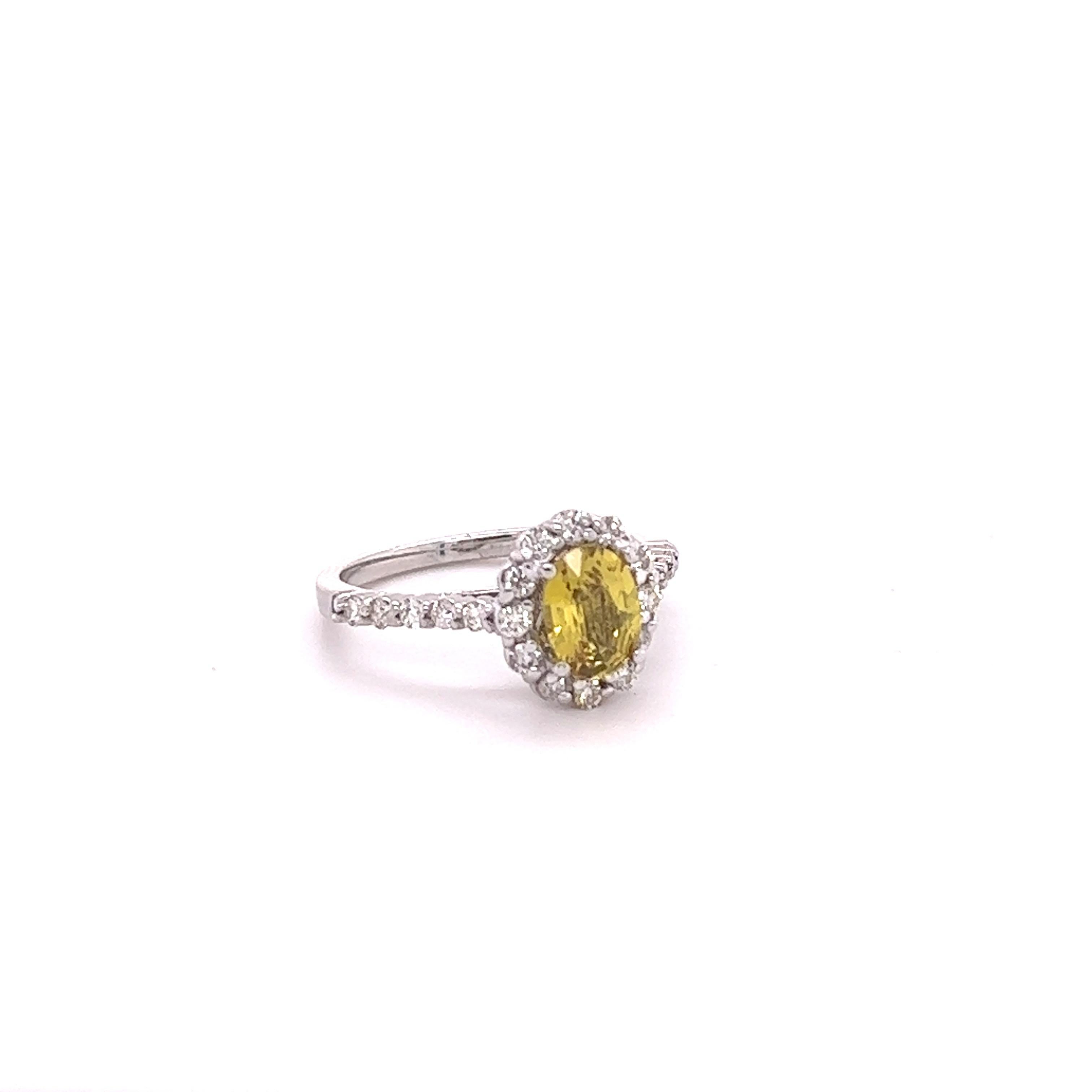 This beautiful ring has a Natural Oval Cut Yellow Sapphire with No Heat that weights 1.62 Carats. 

The ring is embellished with 24 Round Cut Diamonds that weigh 0.52 Carats with a clarity and color of VS/H. 
The total carat weight of the ring is