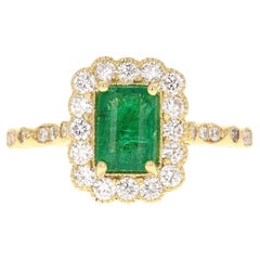 Anello di fidanzamento in oro giallo con diamante smeraldo certificato GIA da 1.63 carati