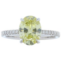 GIA Certified 1.63 Carat Oval Fancy Yellow Diamond White Gold Cocktail Ring