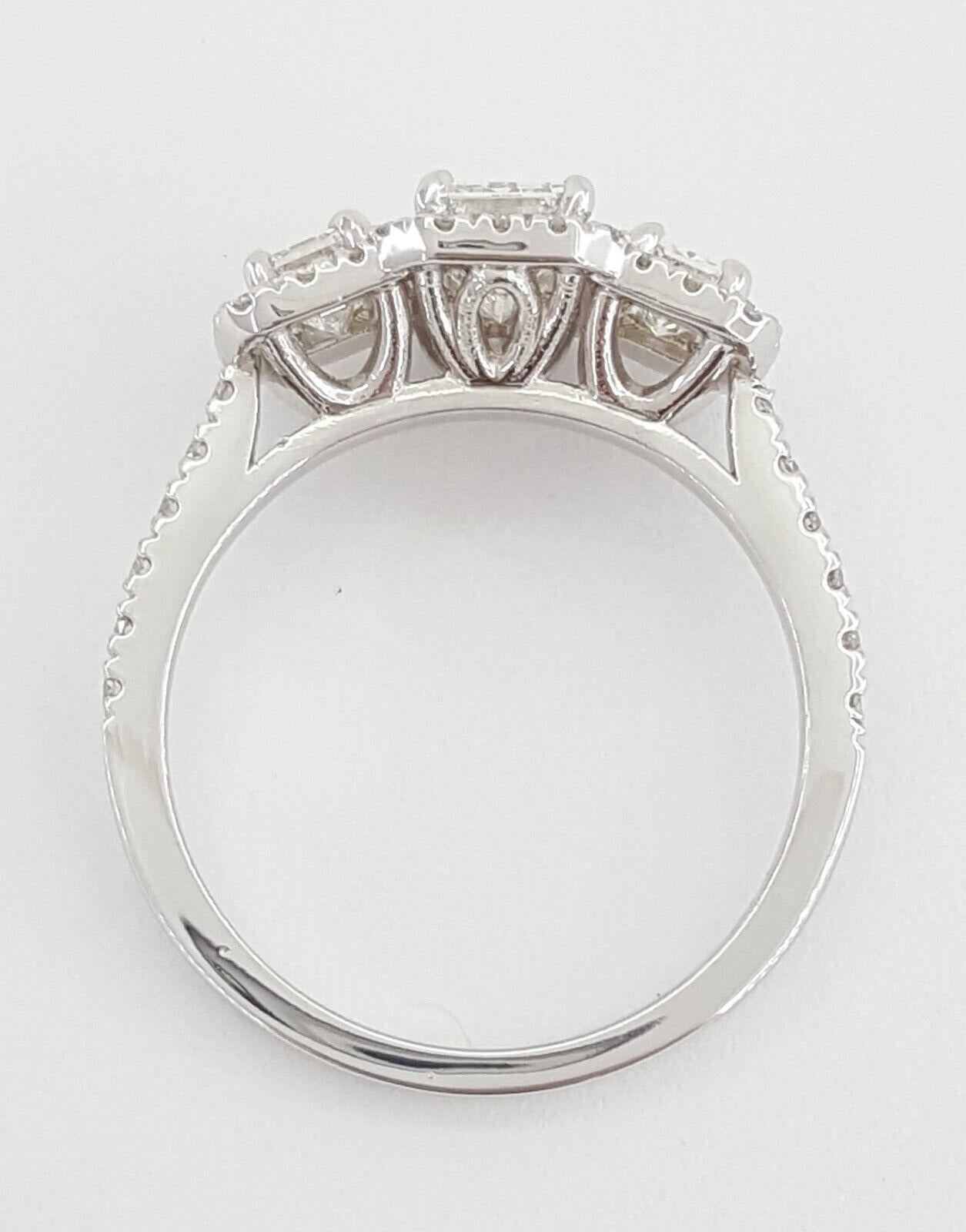 GIA Certified 1.63 Carat Total Weight Three-Stone Emerald Cut Diamond Halo Ring In New Condition For Sale In Chicago, IL