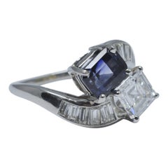 Retro GIA Certified 1.64 Carat Diamond Sapphire Platinum Crossover Ring