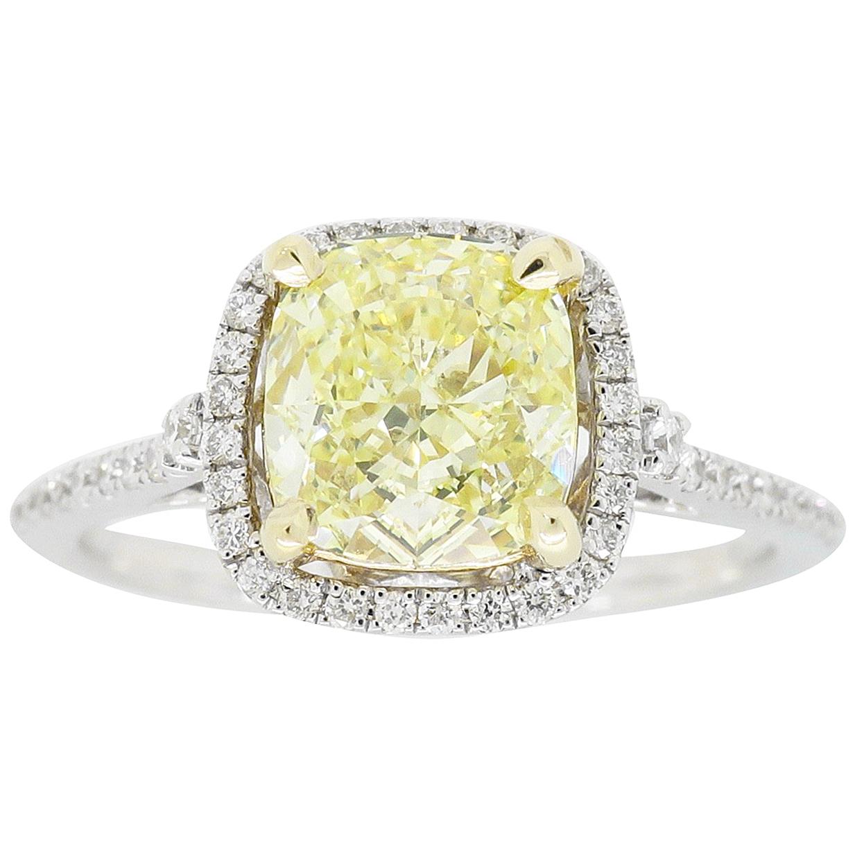 GIA Certified 1.64 Carat Fancy Yellow Diamond Halo Engagement Ring