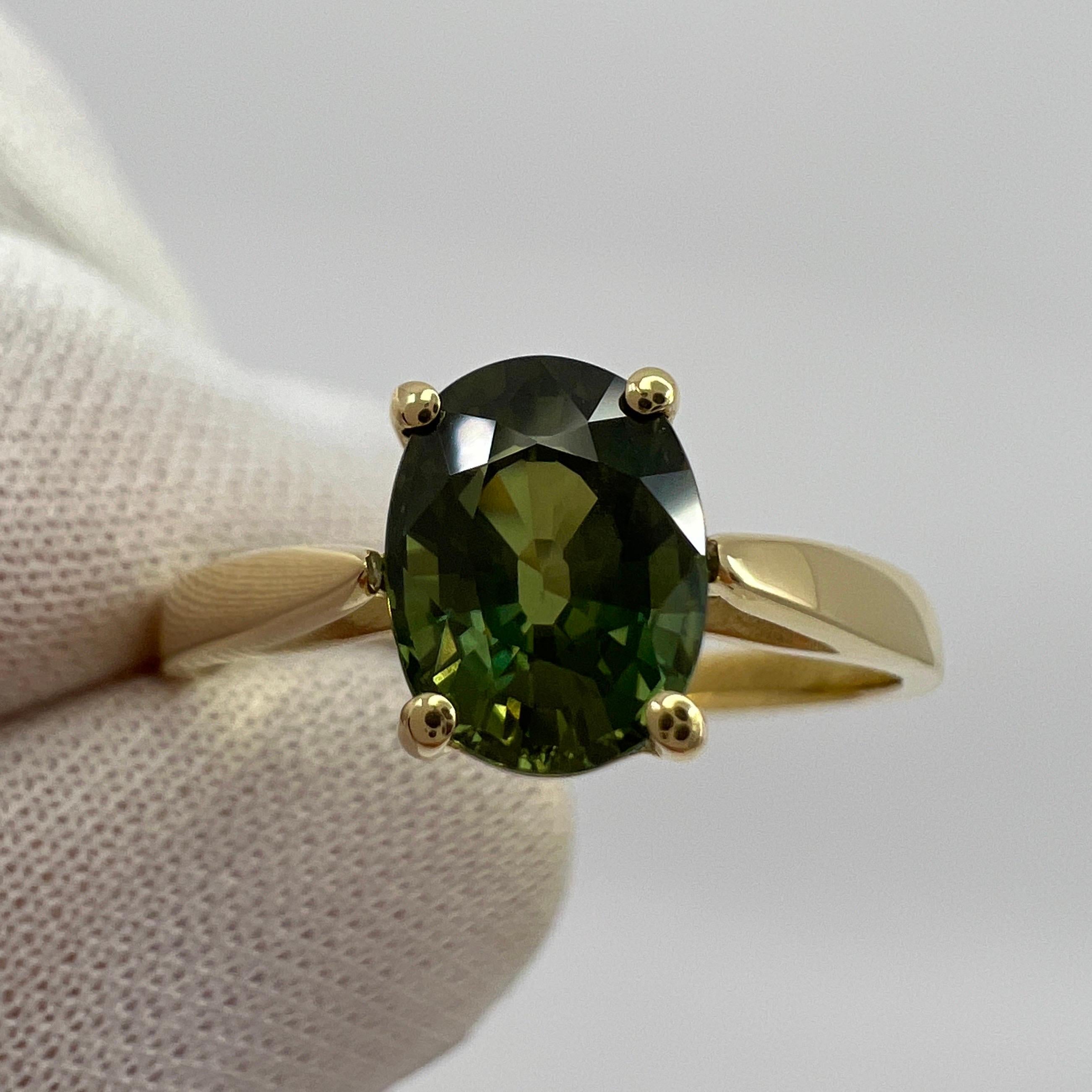 green sapphire solitaire ring