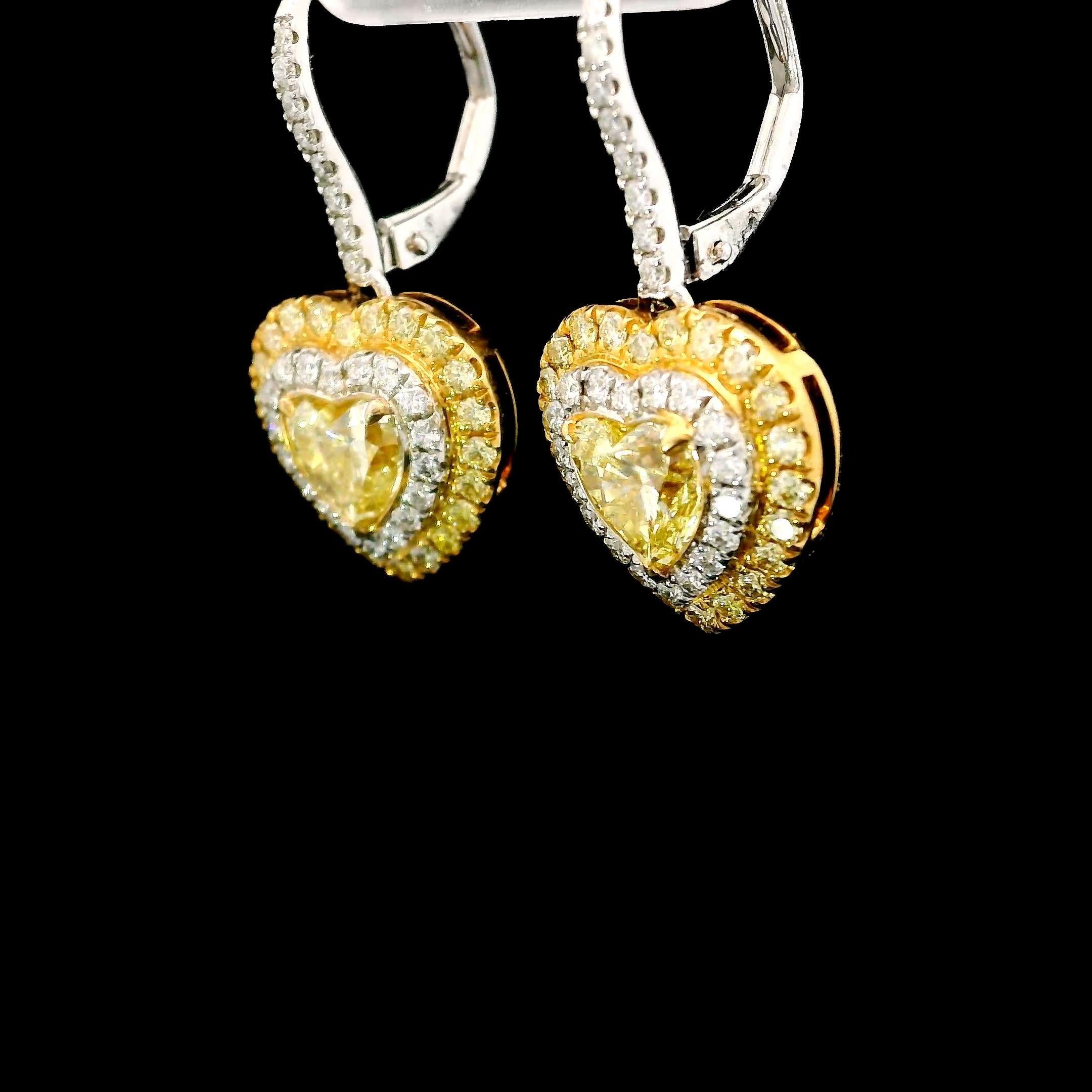 Heart Cut GIA Certified 1.66 Carat Fancy Yellow VS2/VS1 Clarity Diamond Earring For Sale