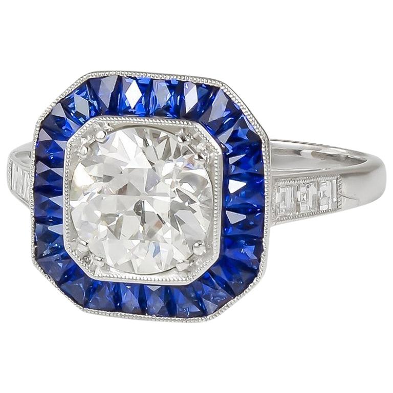 GIA Certified 1.66 Carat Round Cut Center Diamond and Sapphire Ring