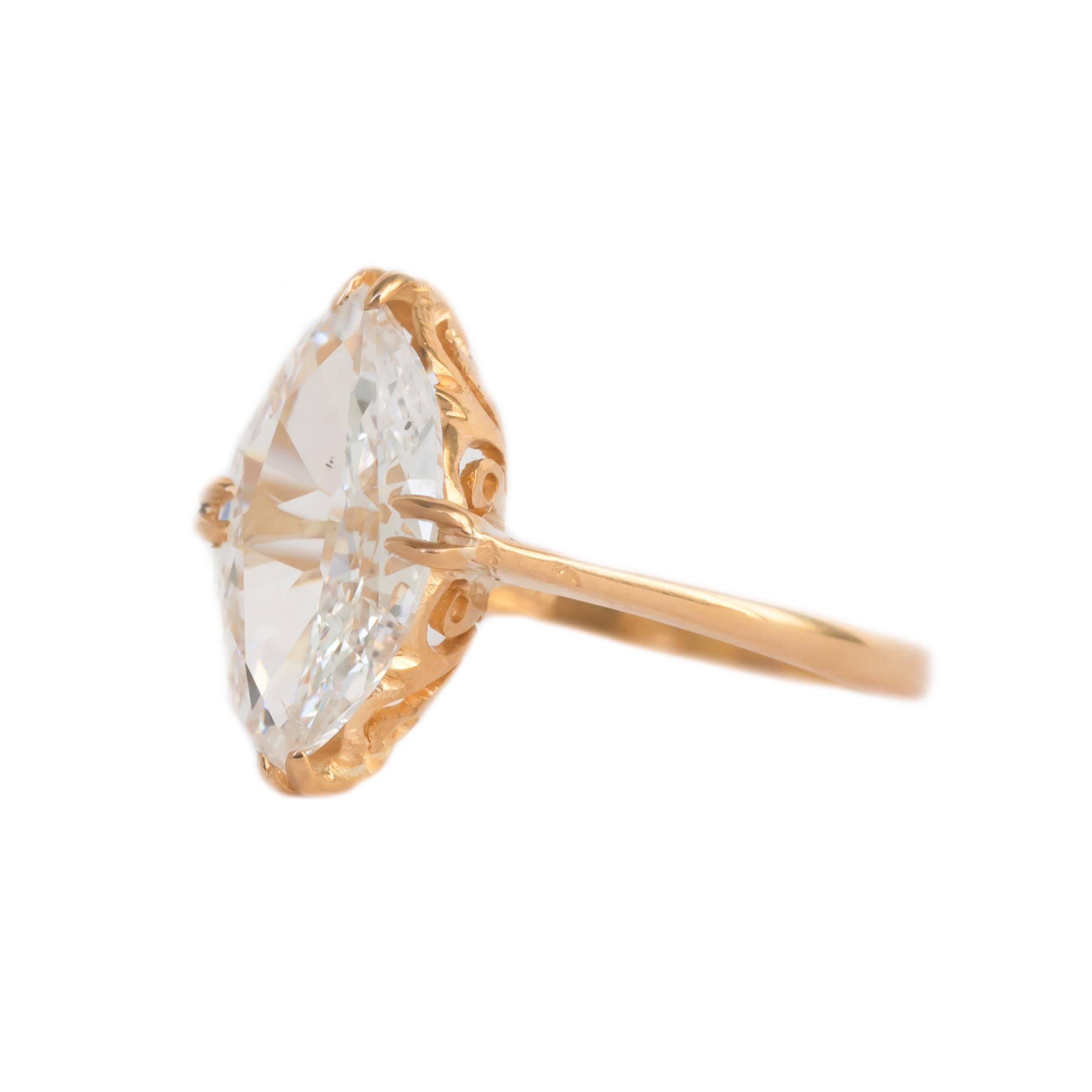 Ring Size: 5.50
Metal Type: 22 karat Yellow Gold  [Hallmarked, and Tested]
Weight: 2.4  grams

Center Diamond Details:
GIA REPORT #1206810951
Weight: 1.66 carat 
Cut: Antique Marquise
Color: E
Clarity: SI2

Finger to Top of Stone Measurement: