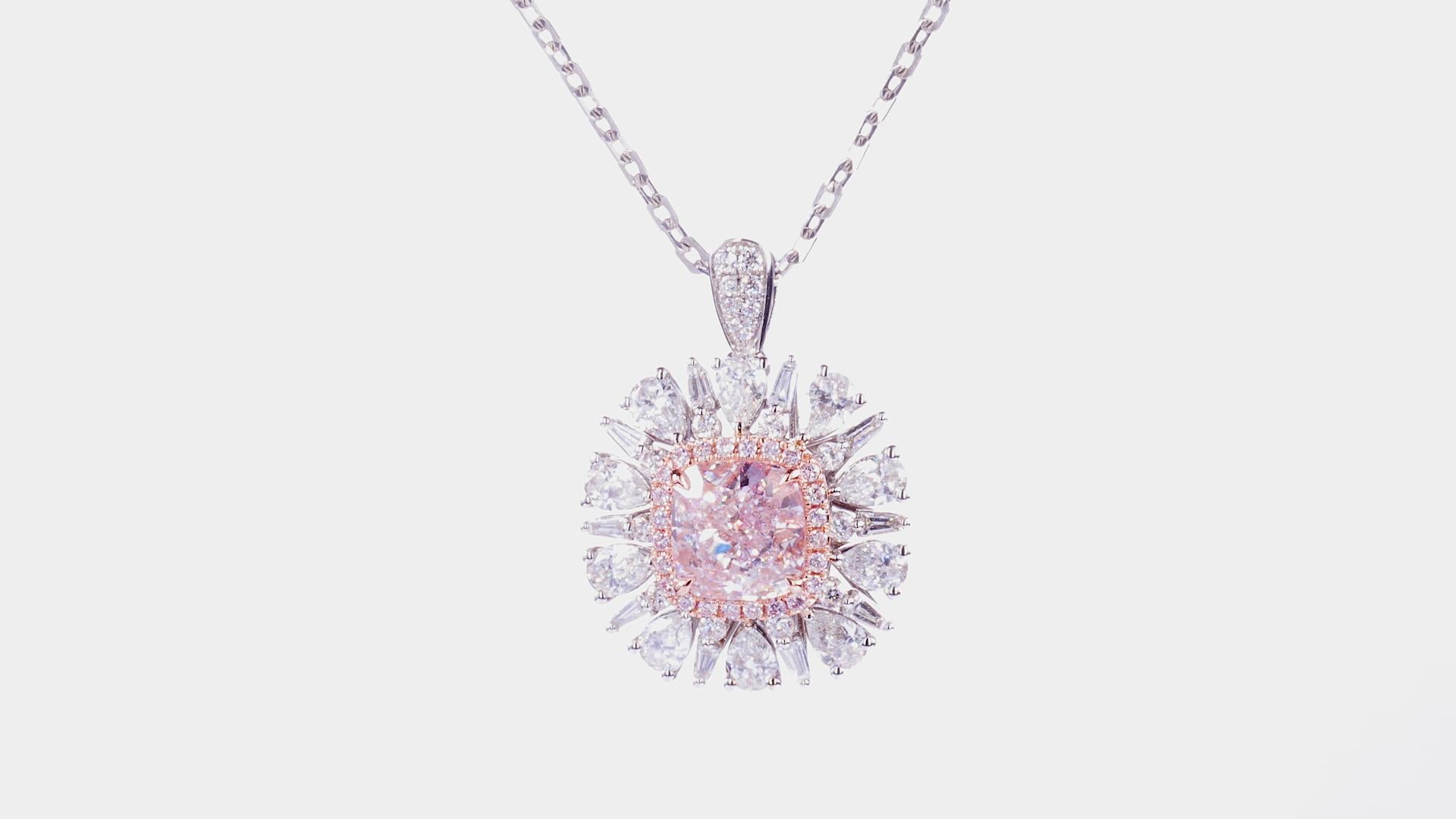 Exquisite 18k White Gold Ring with GIA-Certified Natural Fancy Light Pink Cushion Diamond

Discover the epitome of luxury with this stunning ring, crafted meticulously from 18k white gold and weighing a total of 7.57 grams. The centerpiece of this