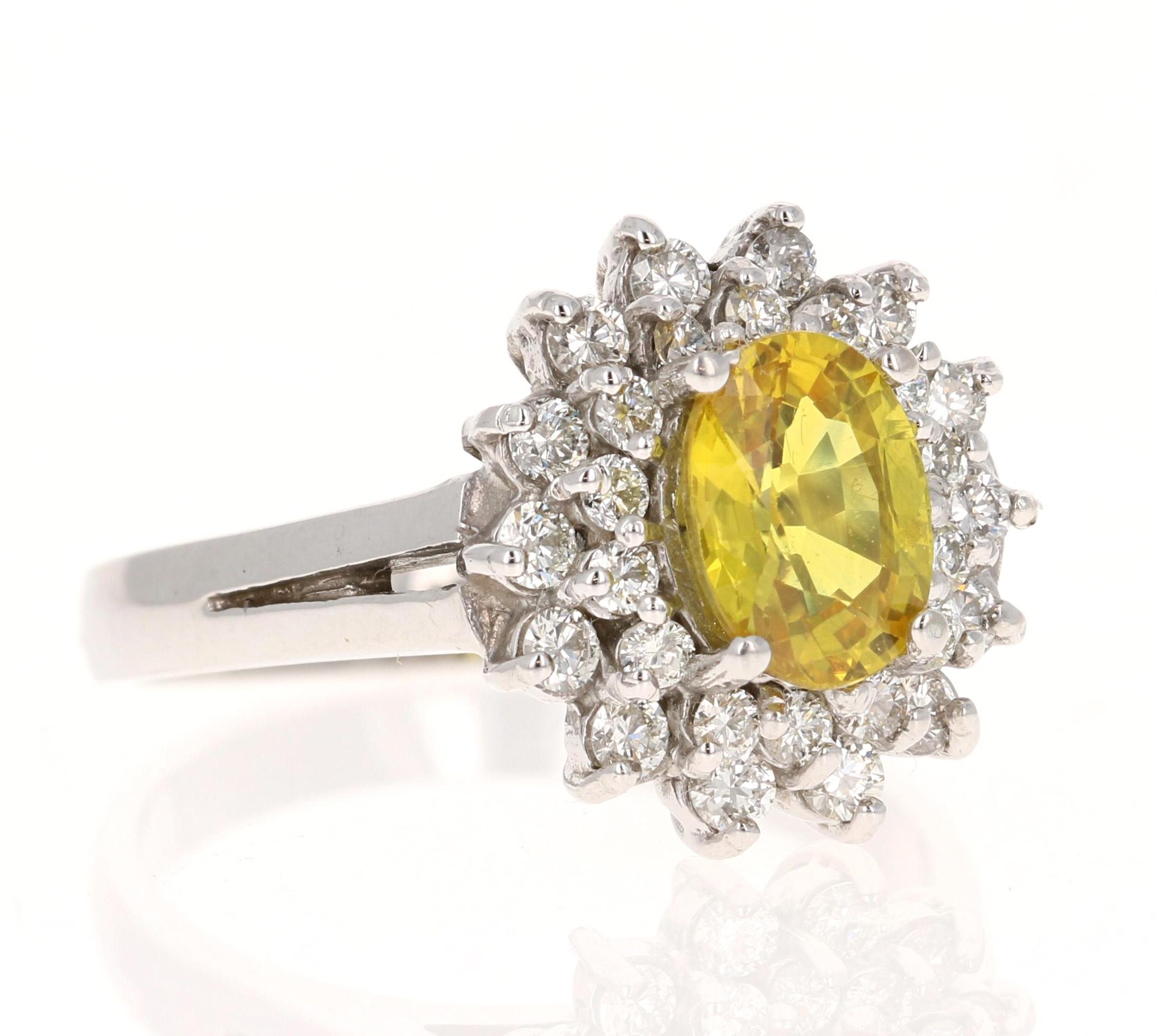 This beautiful ring has a Natural Oval Cut Heated Yellow Sapphire that weights 1.16 Carats. The Yellow Sapphire measures at 7 mm x 5 mm. 

The ring is embellished with 28 Round Cut Diamonds that weigh 0.51 Carats with a clarity and color of SI-F.