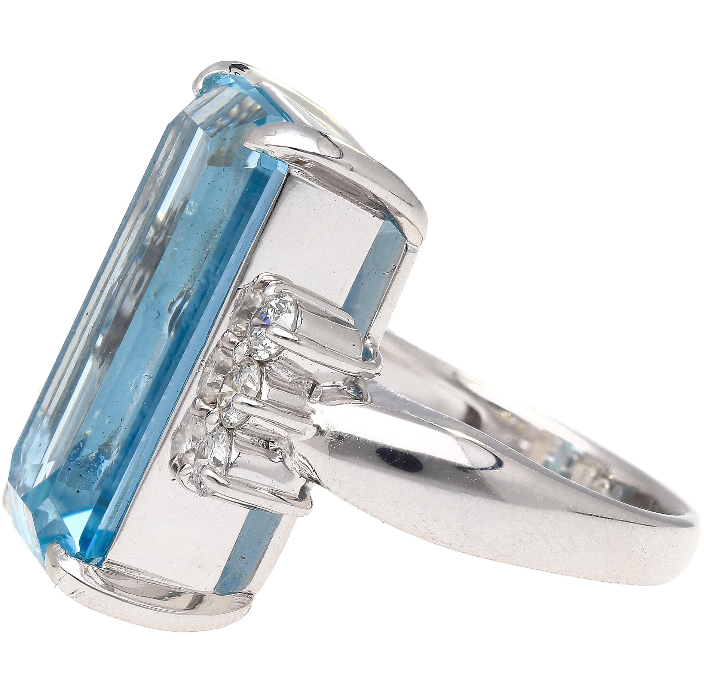 GIA certified 16.70-carat emerald-cut aquamarine at its center, accented by 0.69 carats total weight of round-cut diamond vintage platinum 900 cocktail ring. Ring size 7, adjustable. 

Details:
Item Type: Women's Cocktail Ring
Metal: Platinum