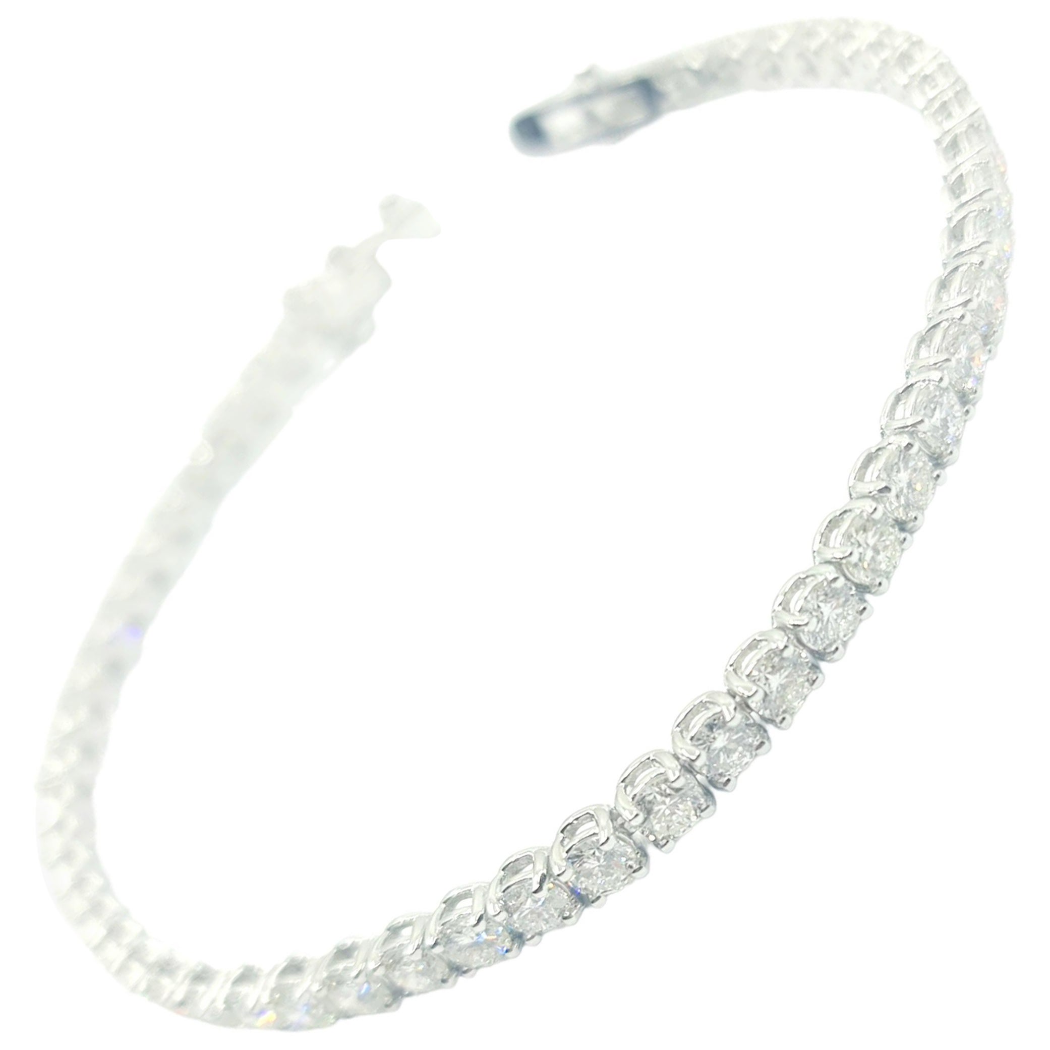 GIA Certified 16.75 Carat G-D/VVS2-FL Diamond Tennis Bracelet 18k White Gold For Sale
