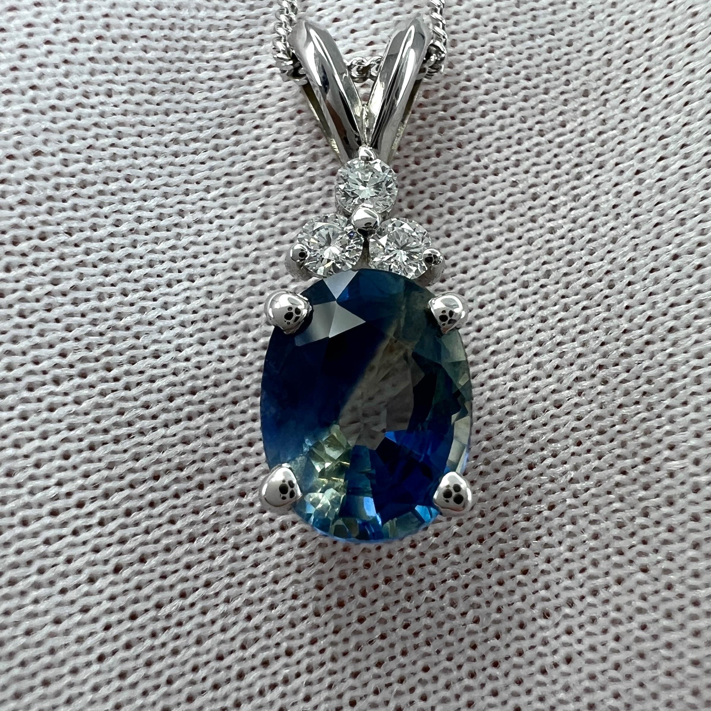 Natural Untreated Bi Colour Sapphire & Diamond 18k White Gold Pendant Necklace.

Rare GIA Certified 1.67 carat natural untreated sapphire with a unique blue - yellow bi colour effect. Very rare and stunning to see, similarly seen in ametrine and