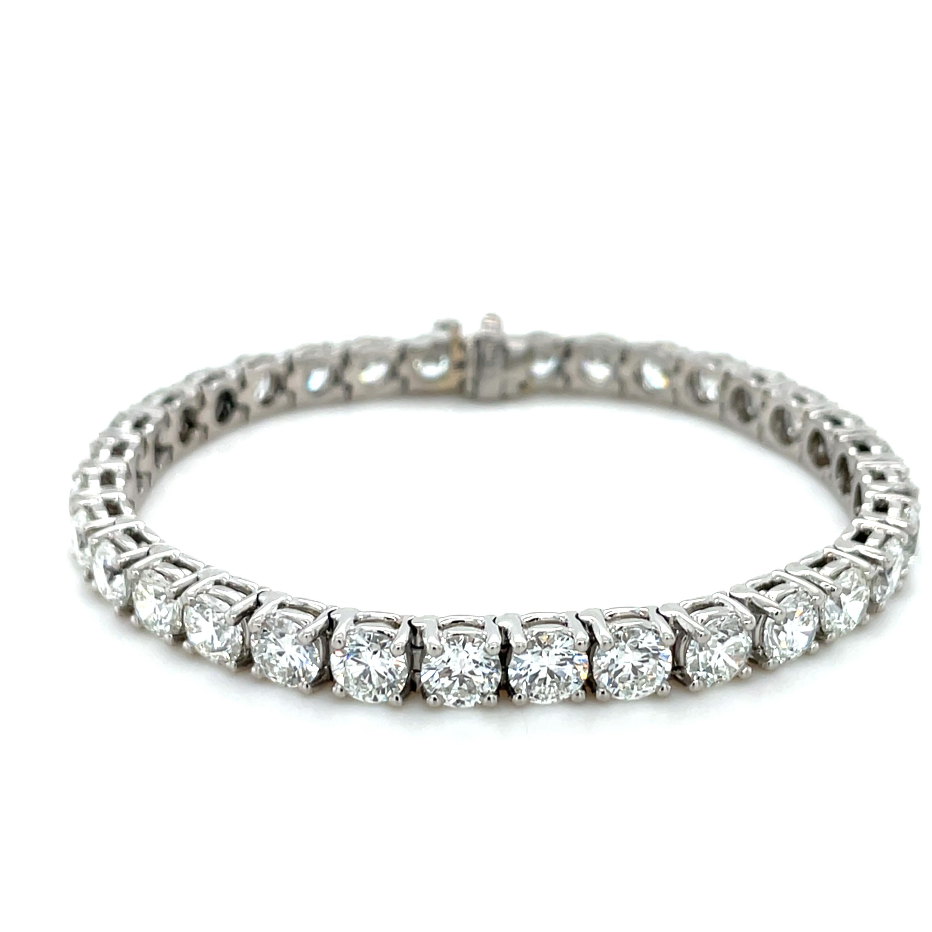 This stunning bracelet contains 33 round brilliant diamonds weighing 16.80 carats total, each with a GIA certificate. Crafted in platinum, this bracelet is extremely well made and a perfect addition to your collection.

GIA graded G-H color, SI2