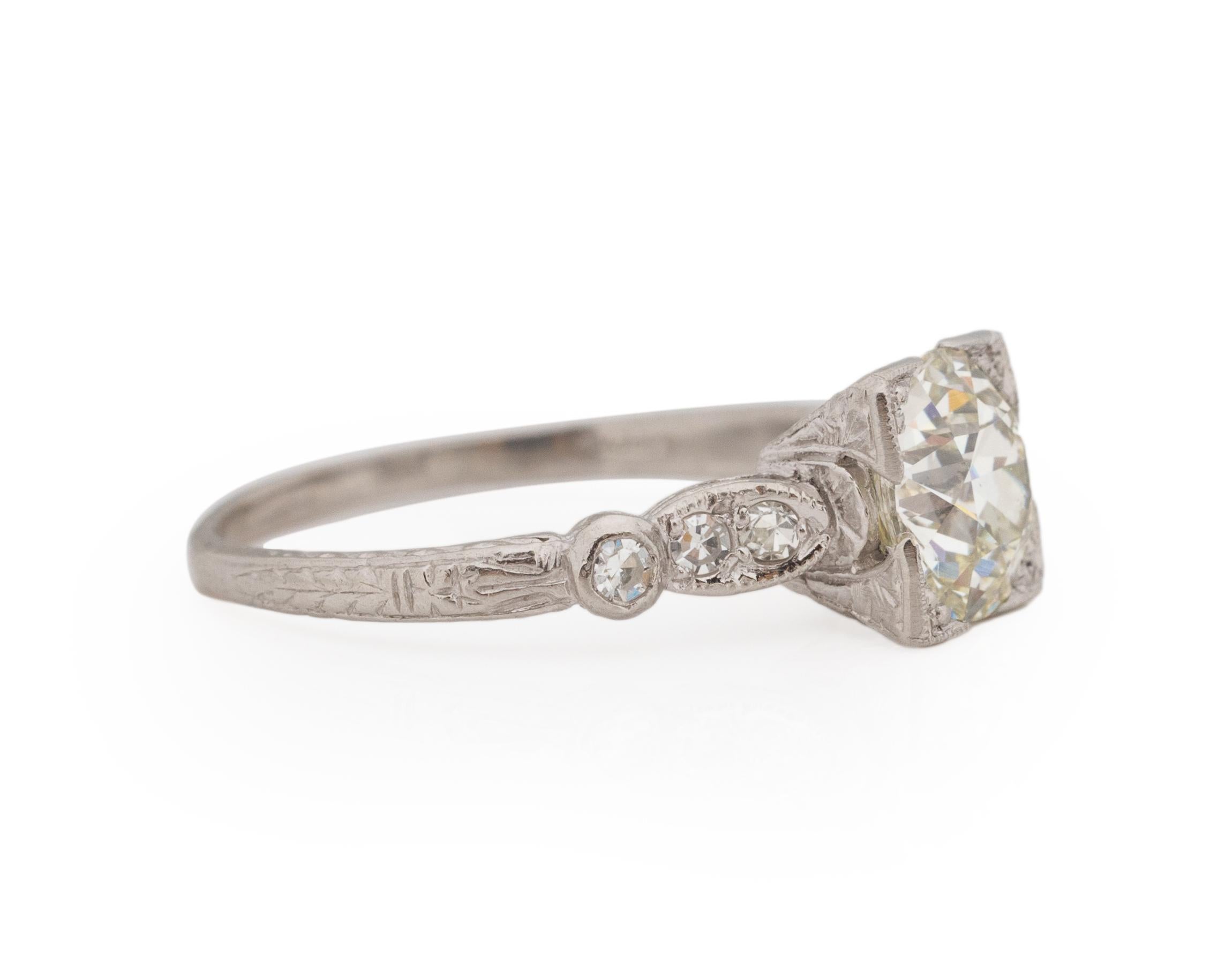 Ring Size: 6.75
Metal Type: Platinum [Hallmarked, and Tested]
Weight: 4.0 grams

Center Diamond Details:
GIA REPORT #: 2223193222
Weight: 1.69ct
Cut: Old European brilliant
Color: N
Clarity: VS1
Measurements: 7.51mm x 7.31mm x 4.91mm

Side Stone