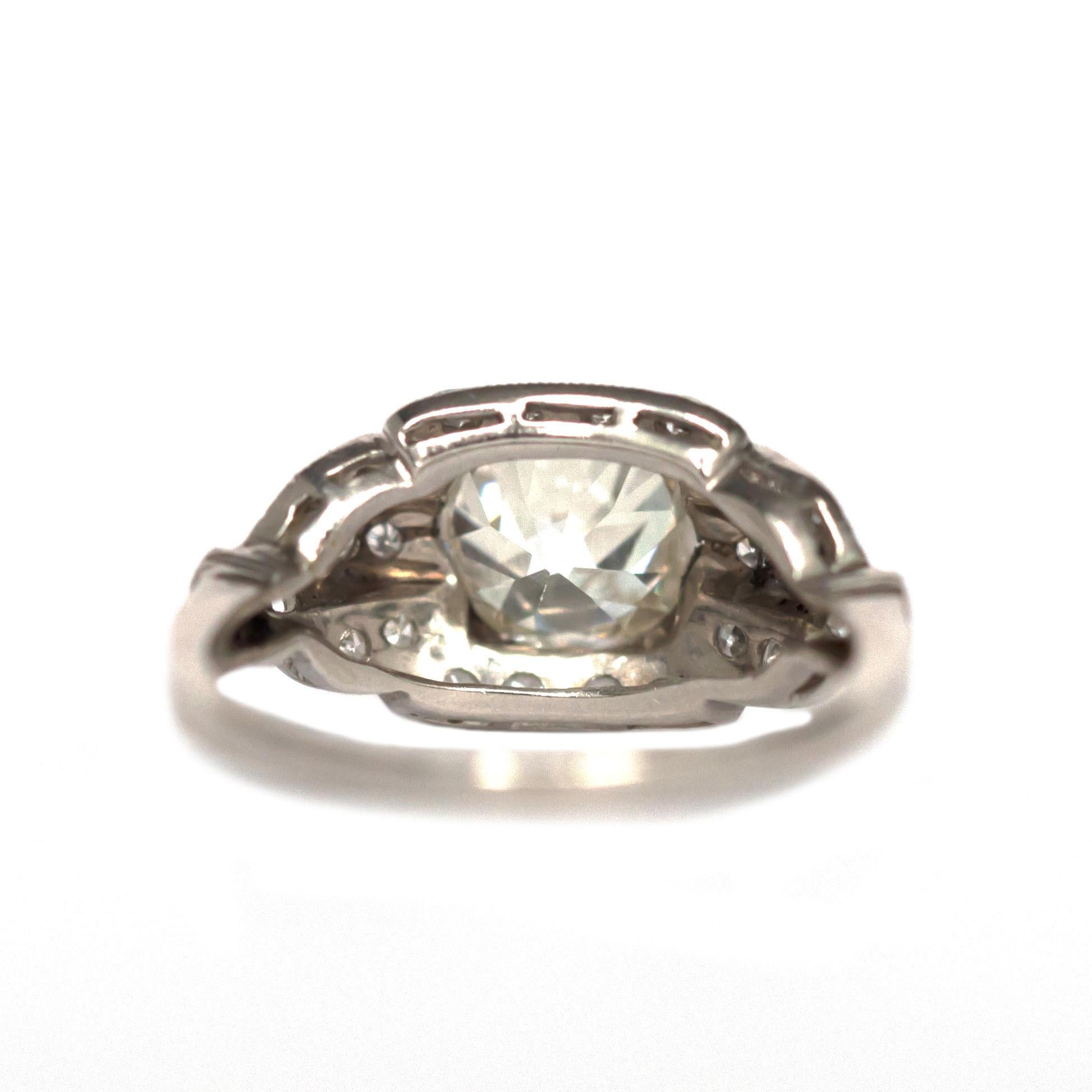 Antique Cushion Cut GIA Certified 1.69 Carat Diamond Platinum Engagement Ring For Sale