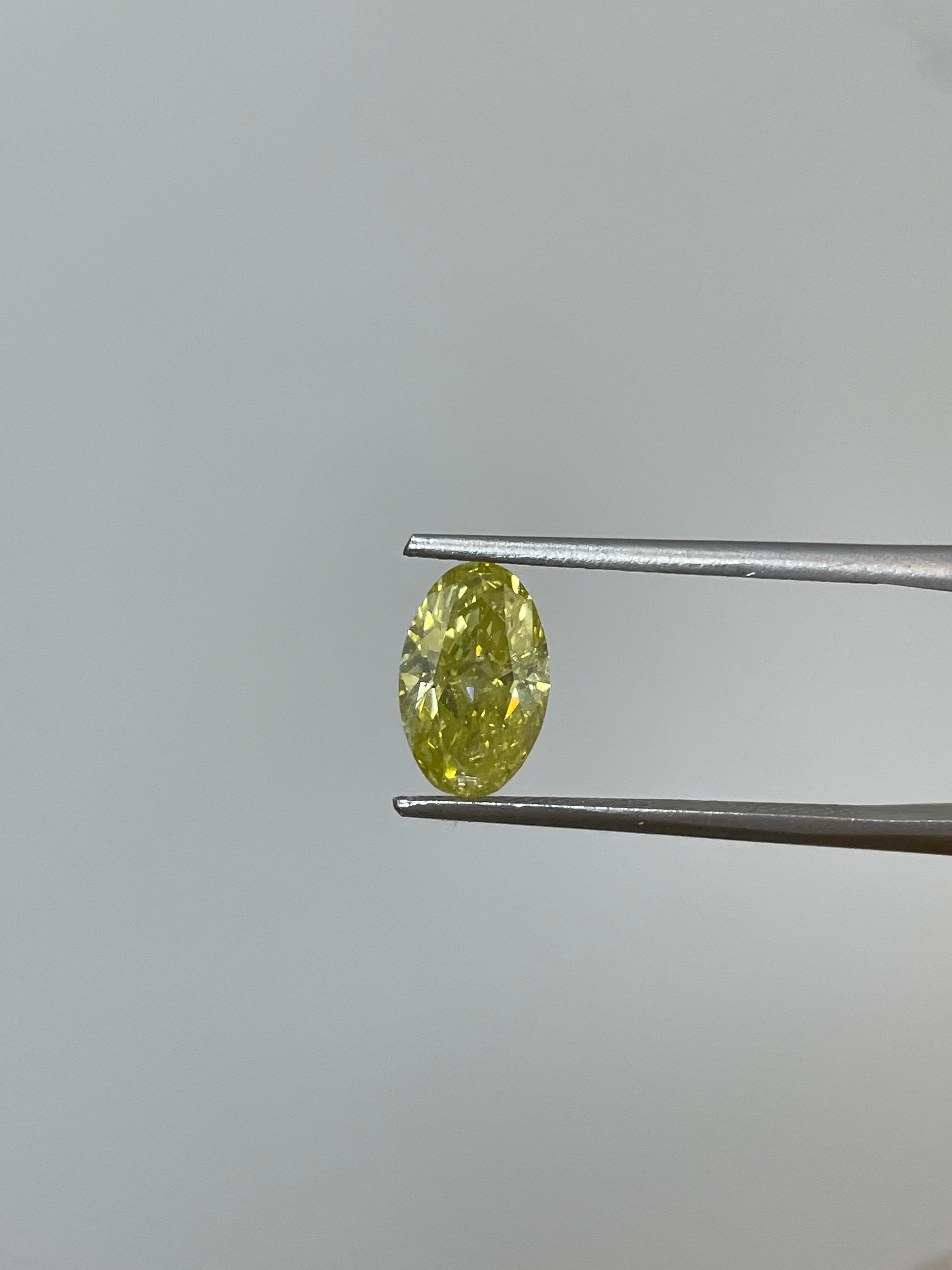 Brilliant Cut GIA Certified 1.69 Carat Oval Brilliant Fancy Intense Yellow I1 Natural Diamond For Sale
