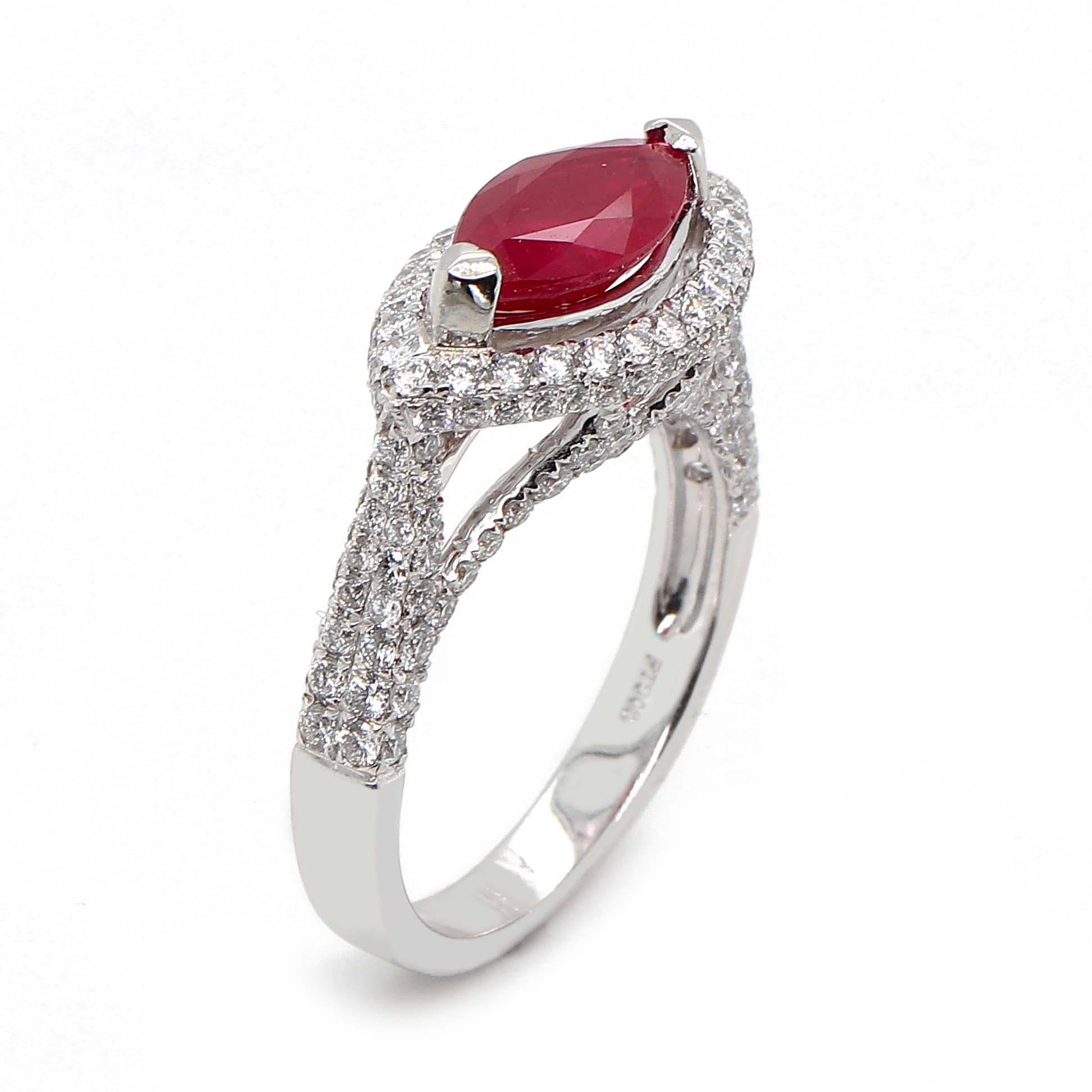 Marquise cut Ruby of about 1.69 carats certified as GIA. The ruby is set in a two prong surrounded by 160 round brilliant cut diamonds of about 1.14 carats, Clarity VS and Color G. All stones are set in a platinum ring with a total weight of 7.15