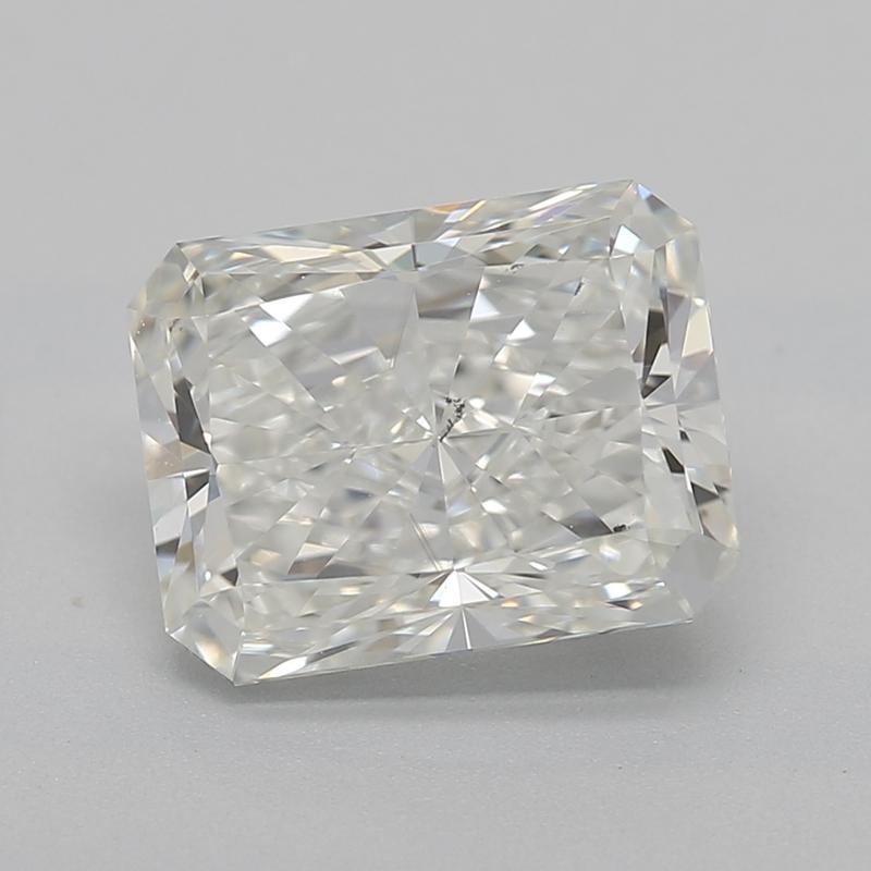 Handcrafted in New York, a stunning diamond ring, set to captivate with a central prong-set diamond featuring a remarkable radiant cut. Weighing an impressive 1.7 and graded with a beautiful J and SI1 , this piece is a true testament to exceptional