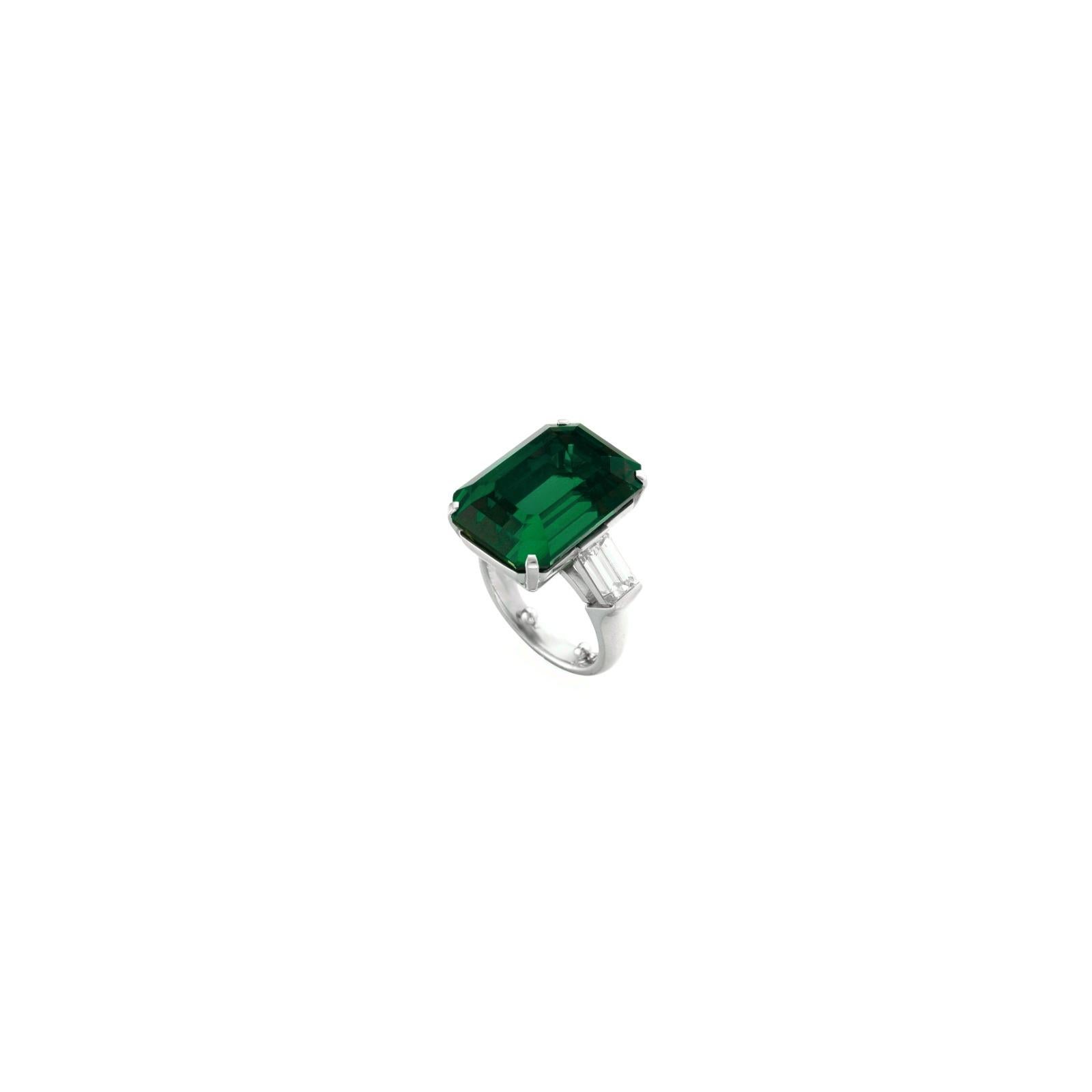 A rare and majestic creation by Antinori di Sanpietro, this spectacular ring showcases a 17 carat EMERALD-cut Zambian emerald, certified by GIA and classified as Minor Oil — a highly desirable level of enhancement for fine emeralds. This exquisite