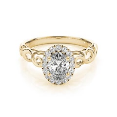 Anello con diamante ovale aureolato certificato GIA da 1.7 carati in oro giallo Cathedral