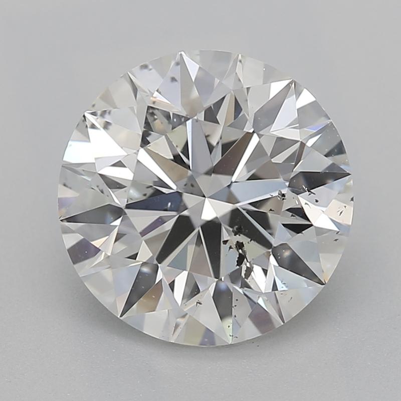 Handcrafted in New York, this exquisite diamond ring features a remarkable center stone of round F SI2 weighing 1.7 , secured in a elegant prong setting that enhances its natural brilliance. A striking hidden halo of pave diamonds accentuates the