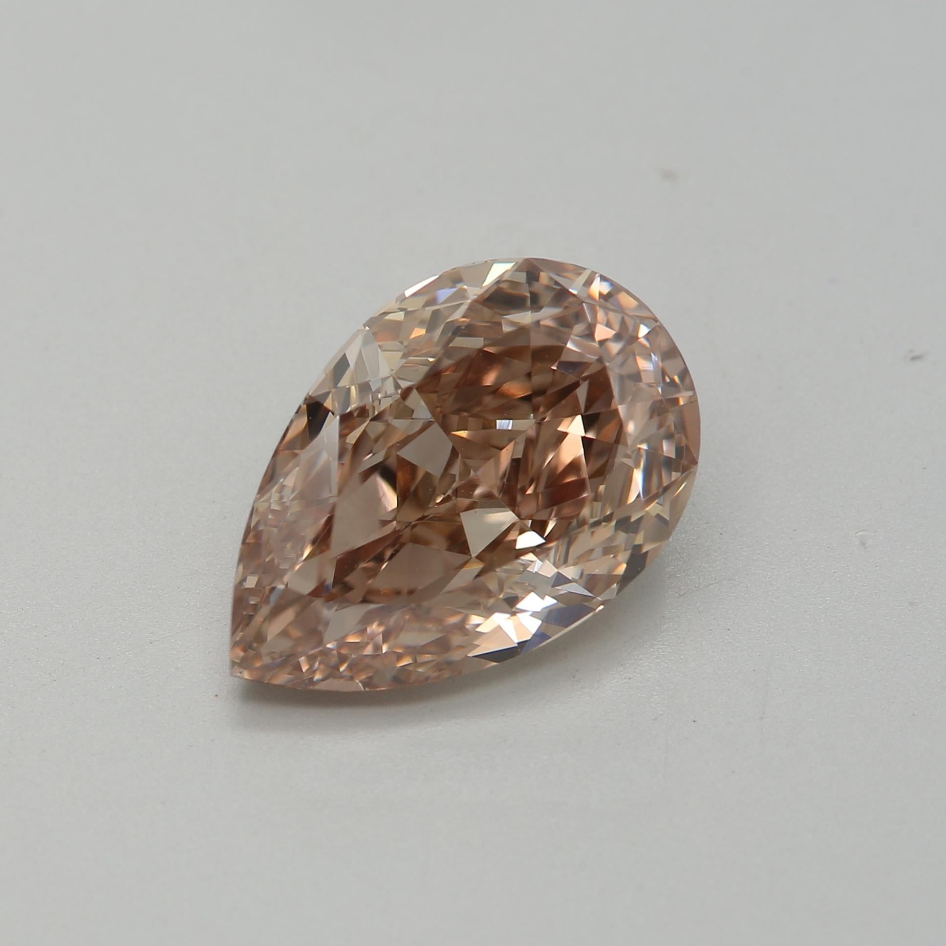 Certificate: GIA
Report Number:  2446137151
Shape And Cut: Pear
Carat Weight: 2.70 carat
Measurements:  11.57 x 7.72 x 4.42 mm
Color Grade: Fancy Orange Brown

FEATURES OF THE DIAMOND:

Our pear-shaped diamond, also known as a teardrop cut, combines