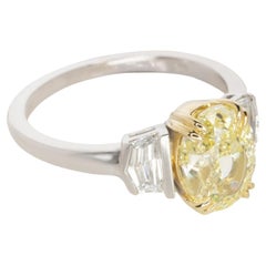 GIA Certified 1.70 Fancy Light Yellow Oval Diamond Ring