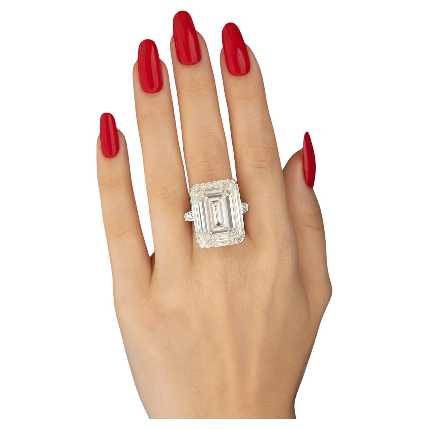 GIA Certified 17.02 Carat Emerald Cut Diamond Platinum Tapered Baguette Ring

An extraordinary and rare jewel, this platinum ring showcases a magnificent GIA certified 17.02 carat emerald cut diamond, accented by classic tapered baguette side
