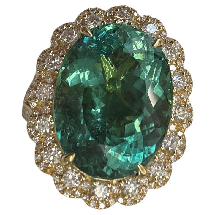 GIA Certified 17.06 Cts with a very beautiful Paraiba Tourmaline Sets in 18K Yellow gold And Diamond Ring 
This is an EFFY ring it's prong setting , it has EFFY stamp and also weight of the center stone and gold weight stamped in the ring , it's a