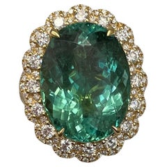 GIA Certified 17.06 Cts Paraiba Tourmaline sets in 18K Yell gold & Diamond Ring
