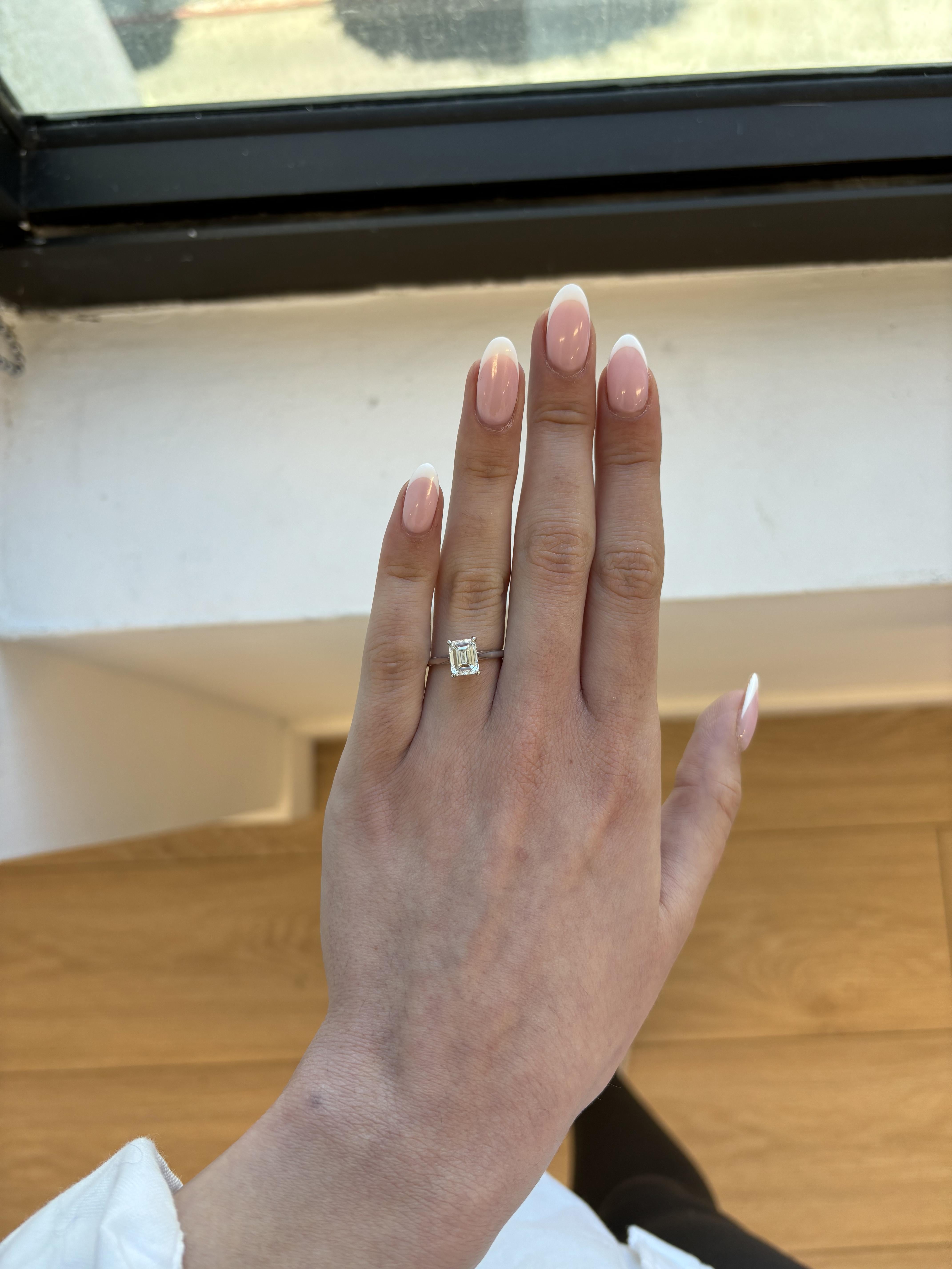 Classic solitaire diamond engagement ring.
1.70 carat emerald cut diamond. GIA certified I color grade and VS1 clarity grade. 14-karat white gold, 2.62 grams, current ring size 5.75.
Accommodated with an up to date digital appraisal by a GIA G.G.,