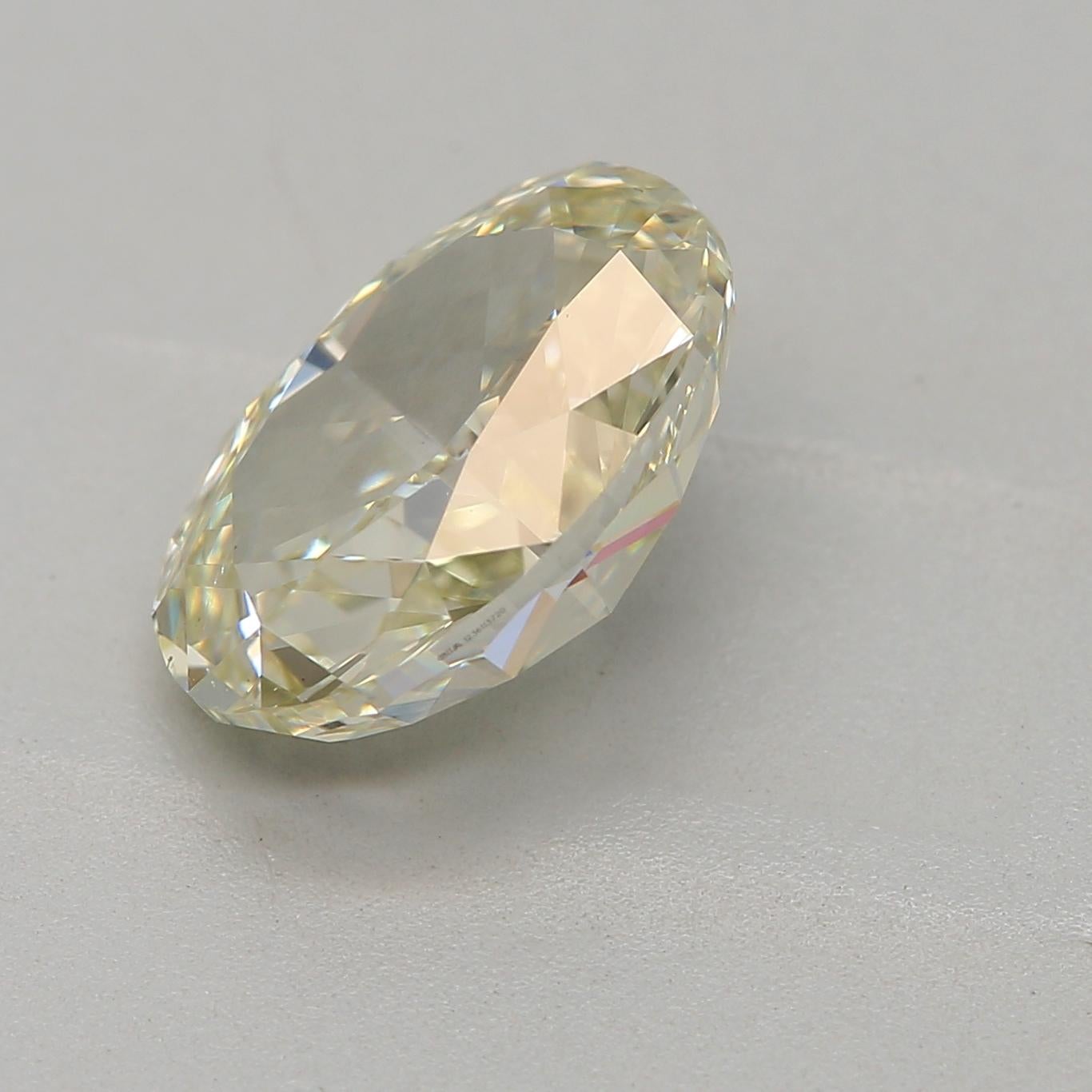 Oval Cut GIA Certified 1.71 Carat Fancy Light Greenish Yellow SI1 Clarity Diamond For Sale