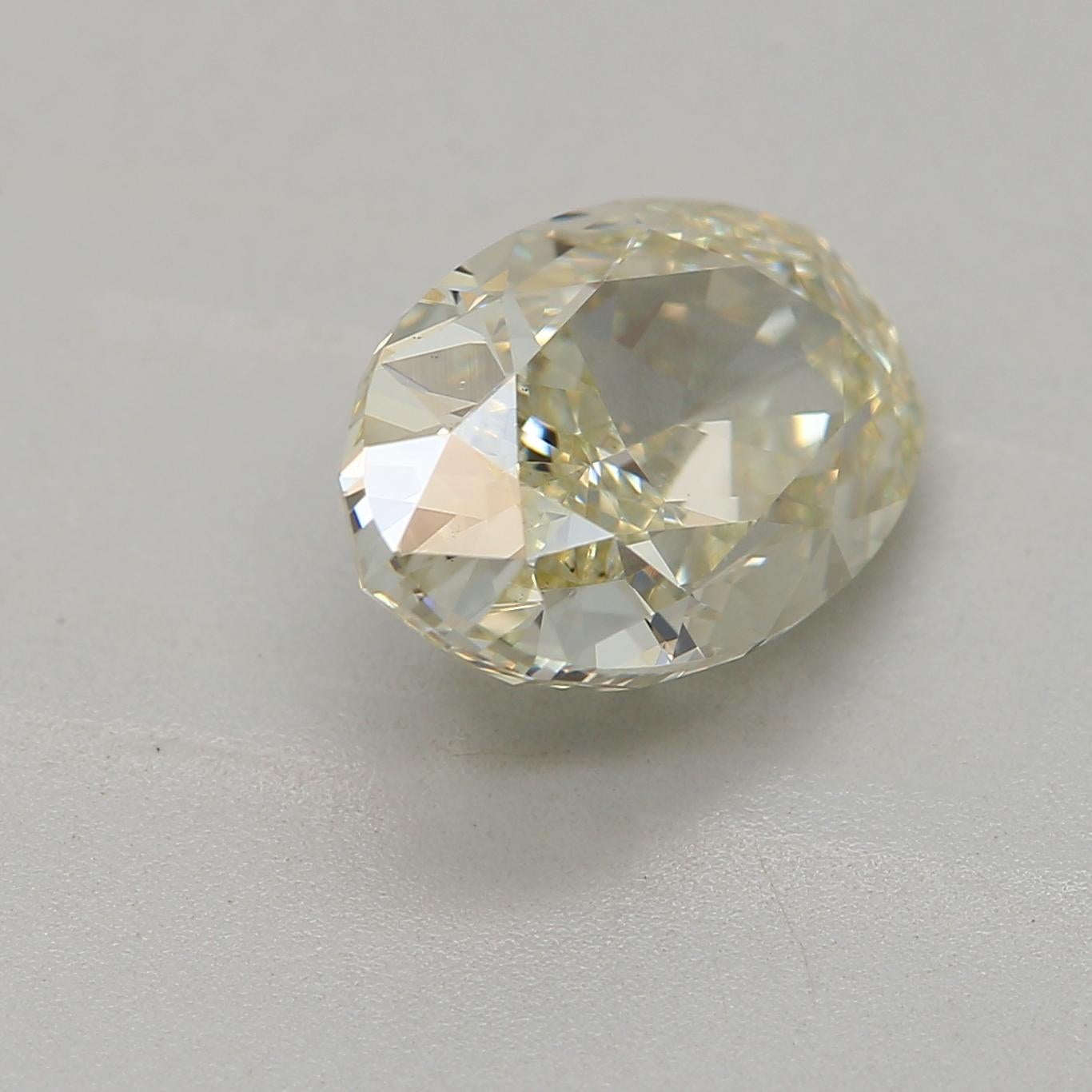 Women's or Men's GIA Certified 1.71 Carat Fancy Light Greenish Yellow SI1 Clarity Diamond For Sale