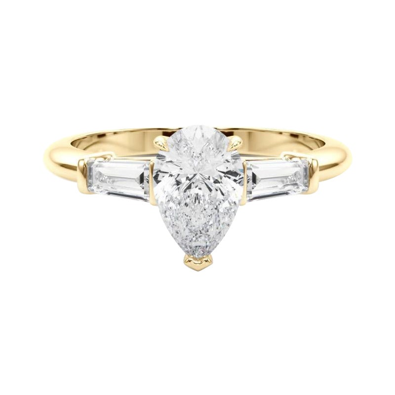 Anello di diamanti a tre pietre con pera e baguette certificato GIA da 1.71 carati