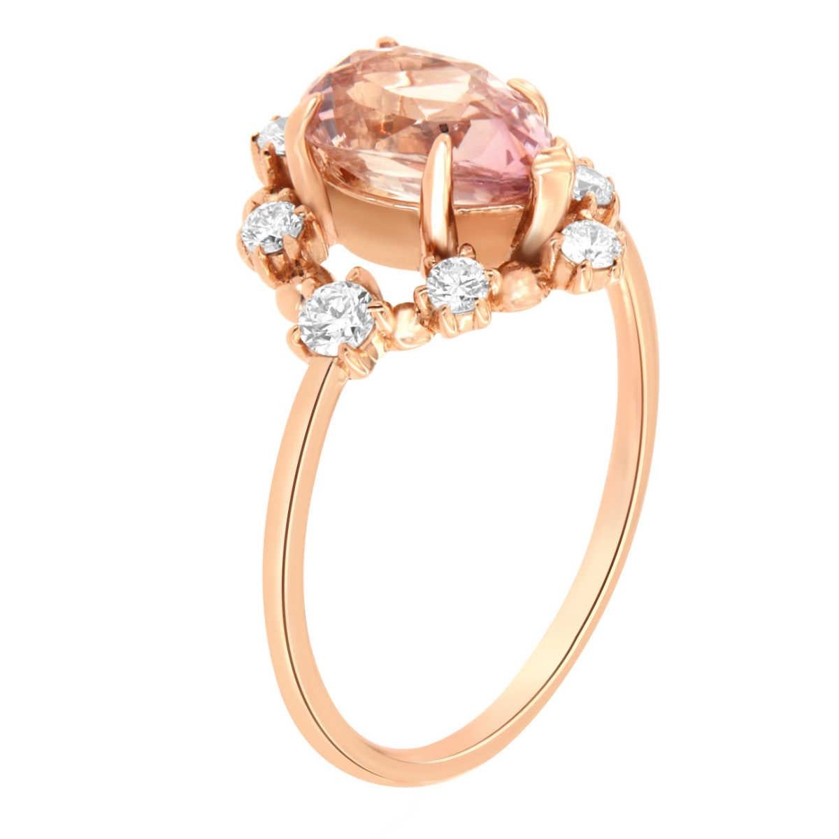 This delicate 14k yellow gold ring features a GIA-certified 1.71 Carat Rare Sri- Lankan Natural Pink sapphire Pear-shaped encircled by a halo of eight (8) brilliant round diamonds in a total of 0.31 carat. The diamonds are G in color and SI1 in
