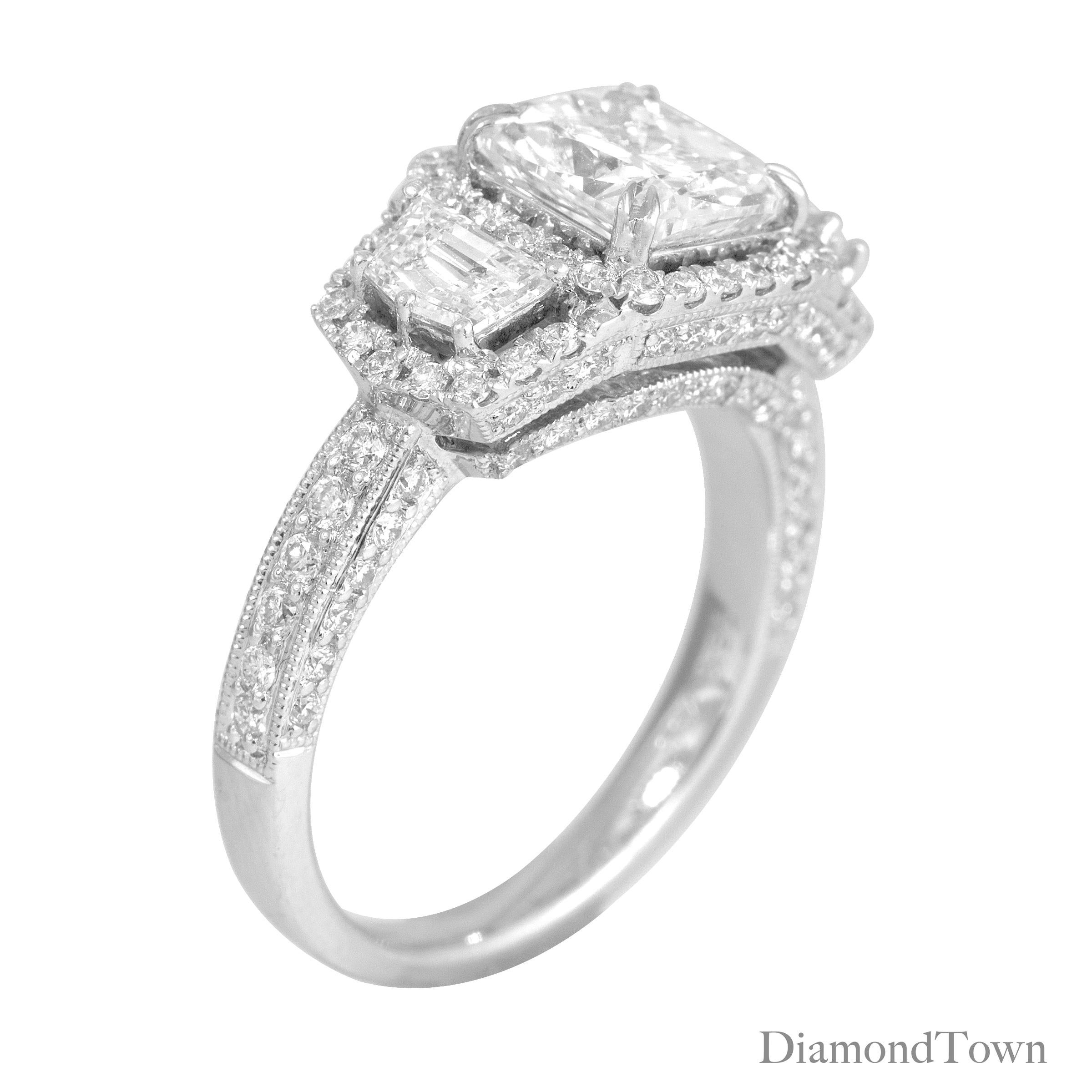 This exquisite, handcrafted ring boasts a 1.72 carat GIA certified cushion-cut center diamond, with two half-moon diamonds gracefully adorning its sides. Each of these three main stones is encircled by a halo of round white diamonds that extends