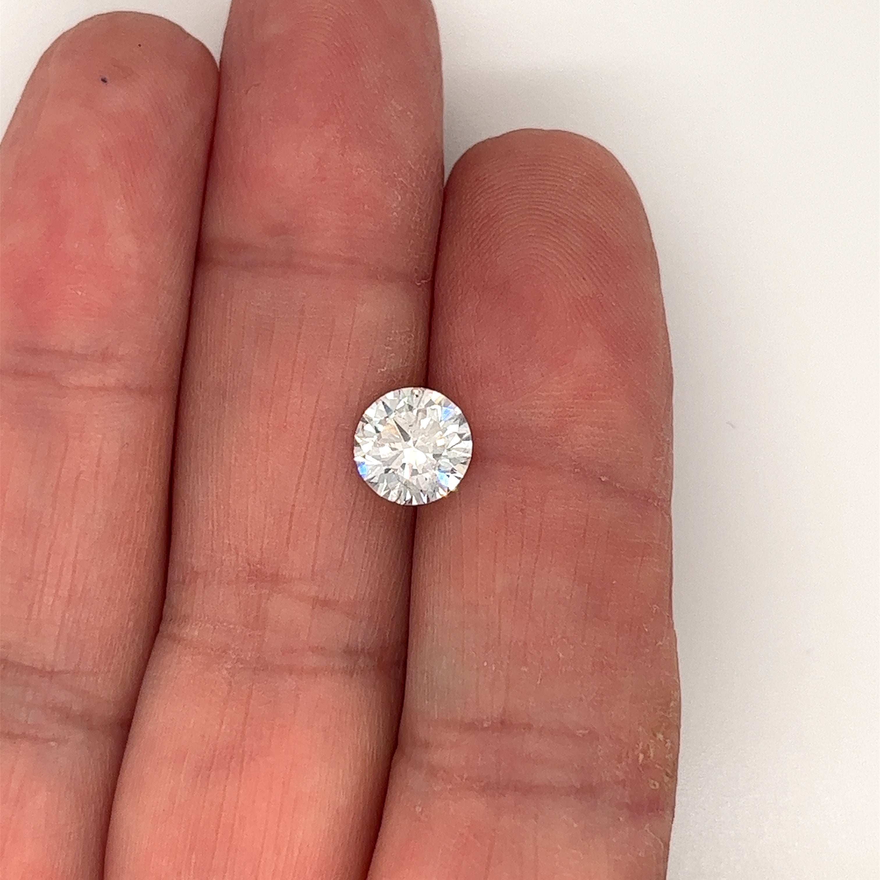 GIA certified natural 1.72-carat round-brilliant loose diamond with H color and I1 clarity. Featuring excellent cut, polish and symmetry. The stone is an absolute bargain considering how it optically looks. The inclusions are in not visible to the