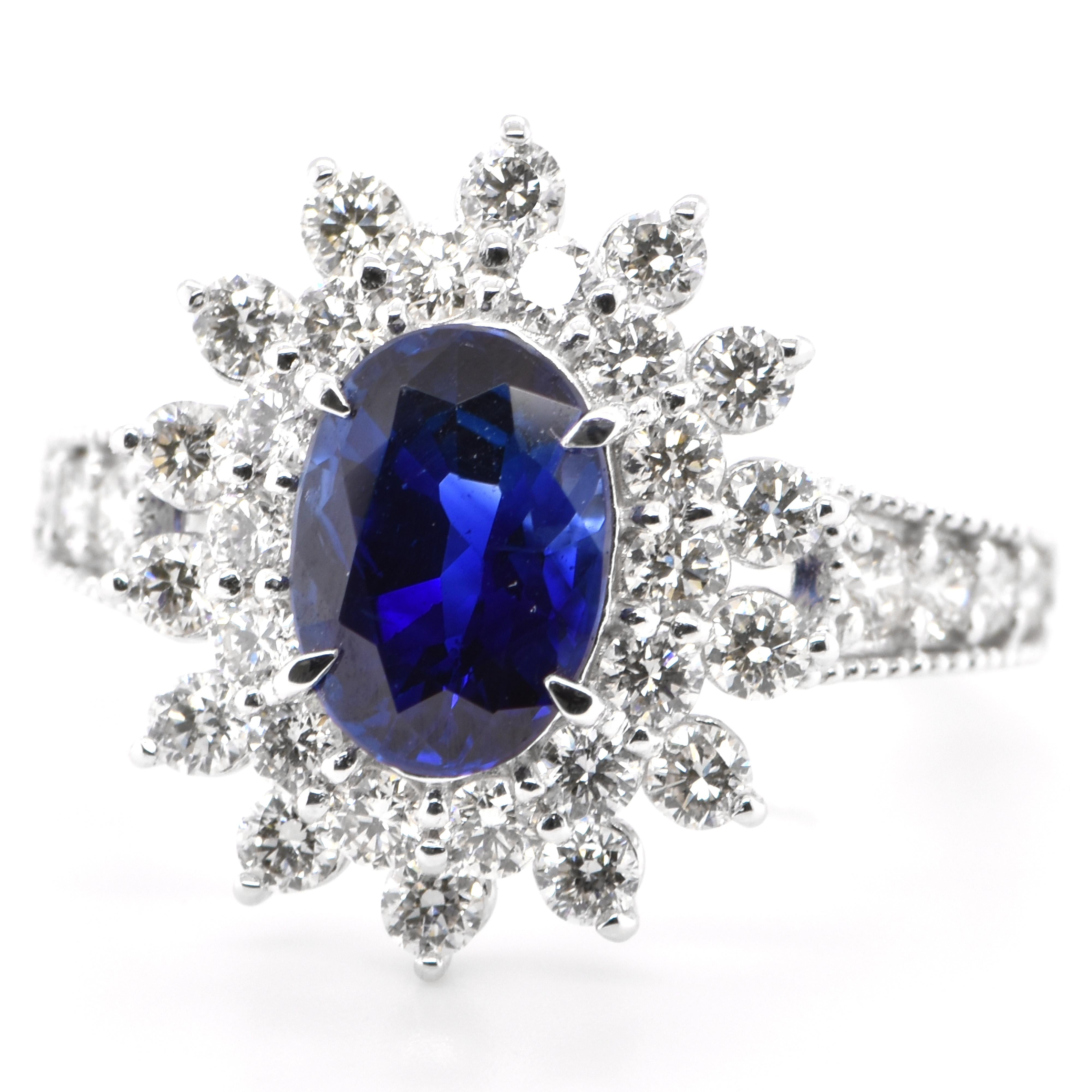 A beautiful Ring featuring a GIA Certified 1.73 Carat Natural Madagascar Blue Sapphire and 1.08 Carats Diamond Accents set in Platinum. Sapphires have extraordinary durability - they excel in hardness as well as toughness and durability making them