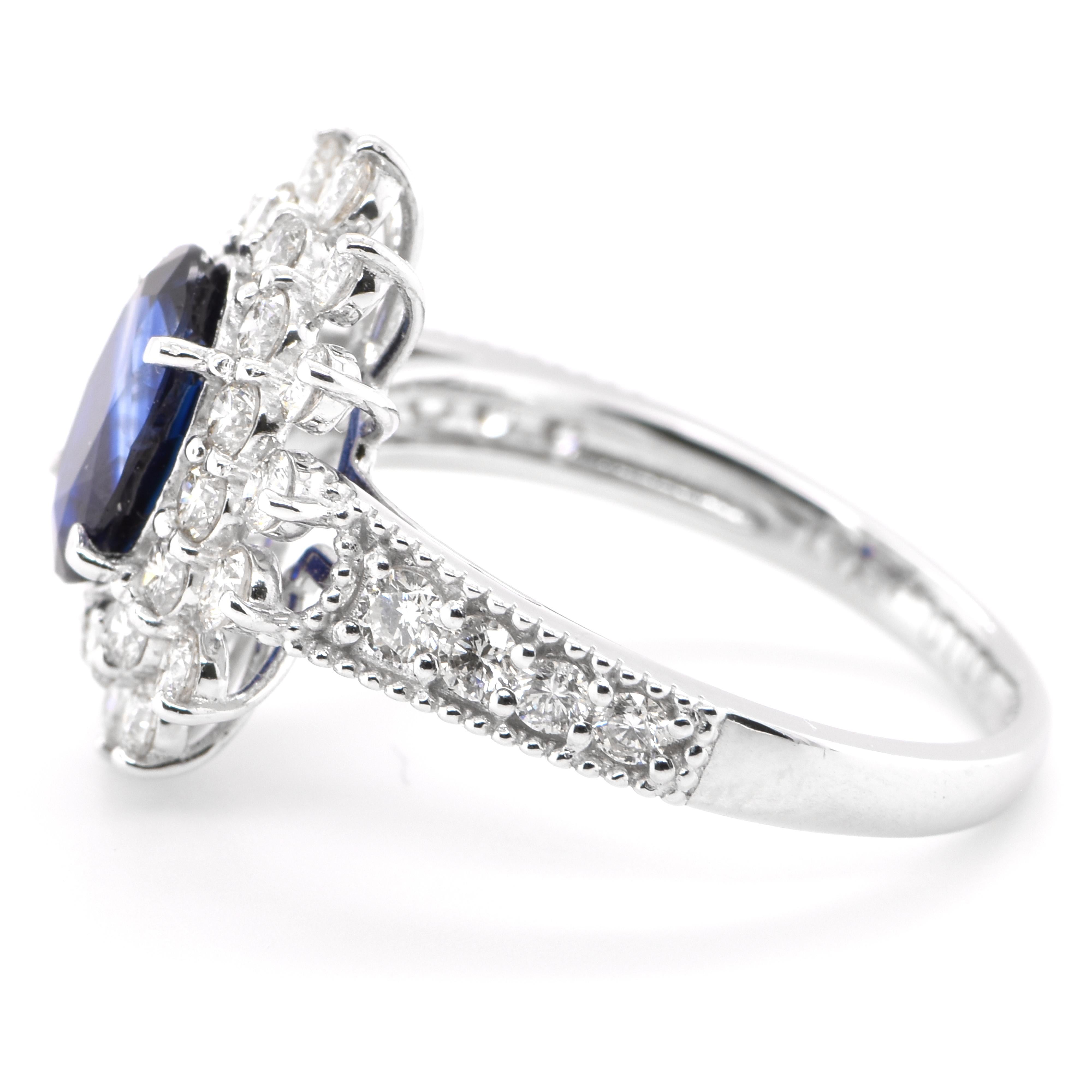 Modern GIA Certified 1.73 Carat Natural African Blue Sapphire Ring Set in Platinum