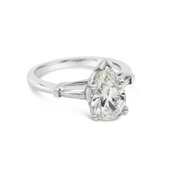GIA Certified 1.74 Carats Pear Shape Diamond Three-Stone Engagement Ring