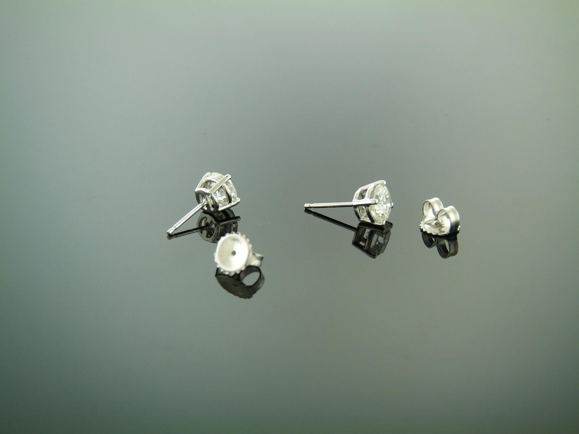 Modern GIA Certified 0.87 & 0.89 Carat H Color Diamond Stud Earrings